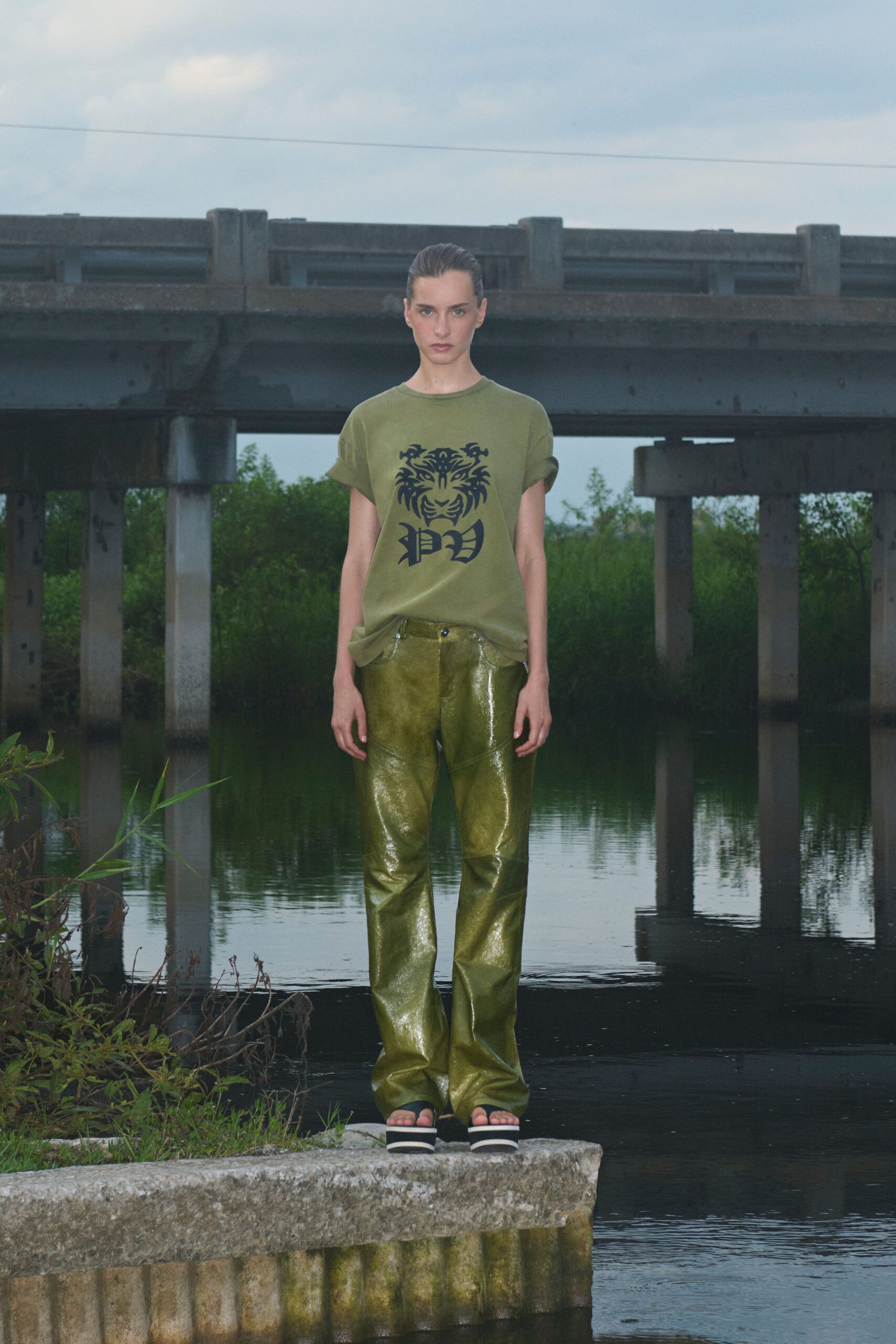 green vinyl fitted straight-leg shiny pants