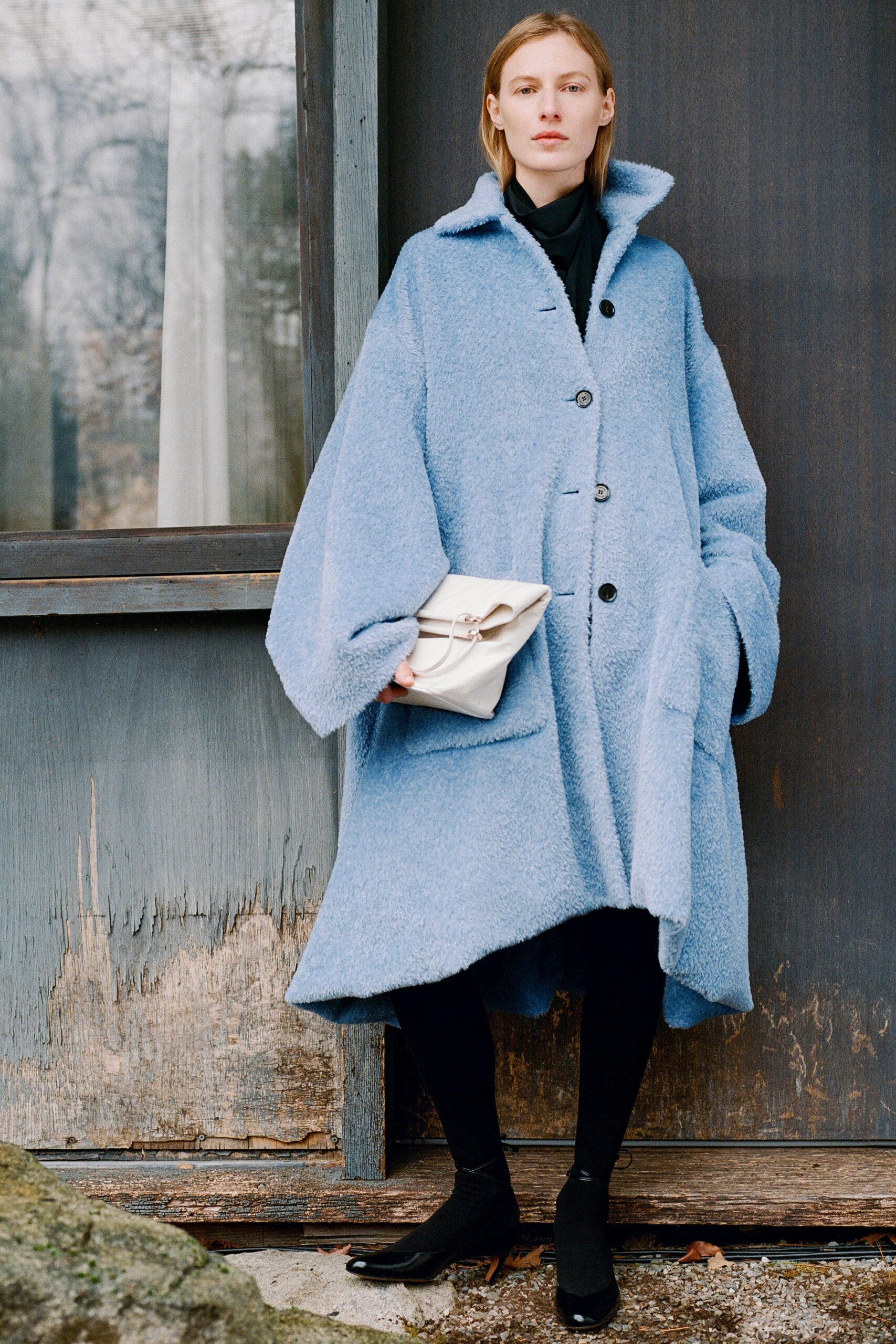 blue wool long-sleeve collared oversized buttoned draped coat