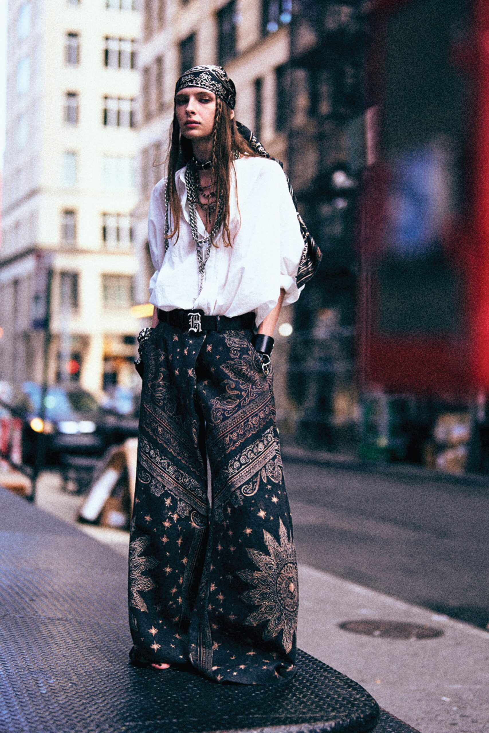 white shirt black printed pants