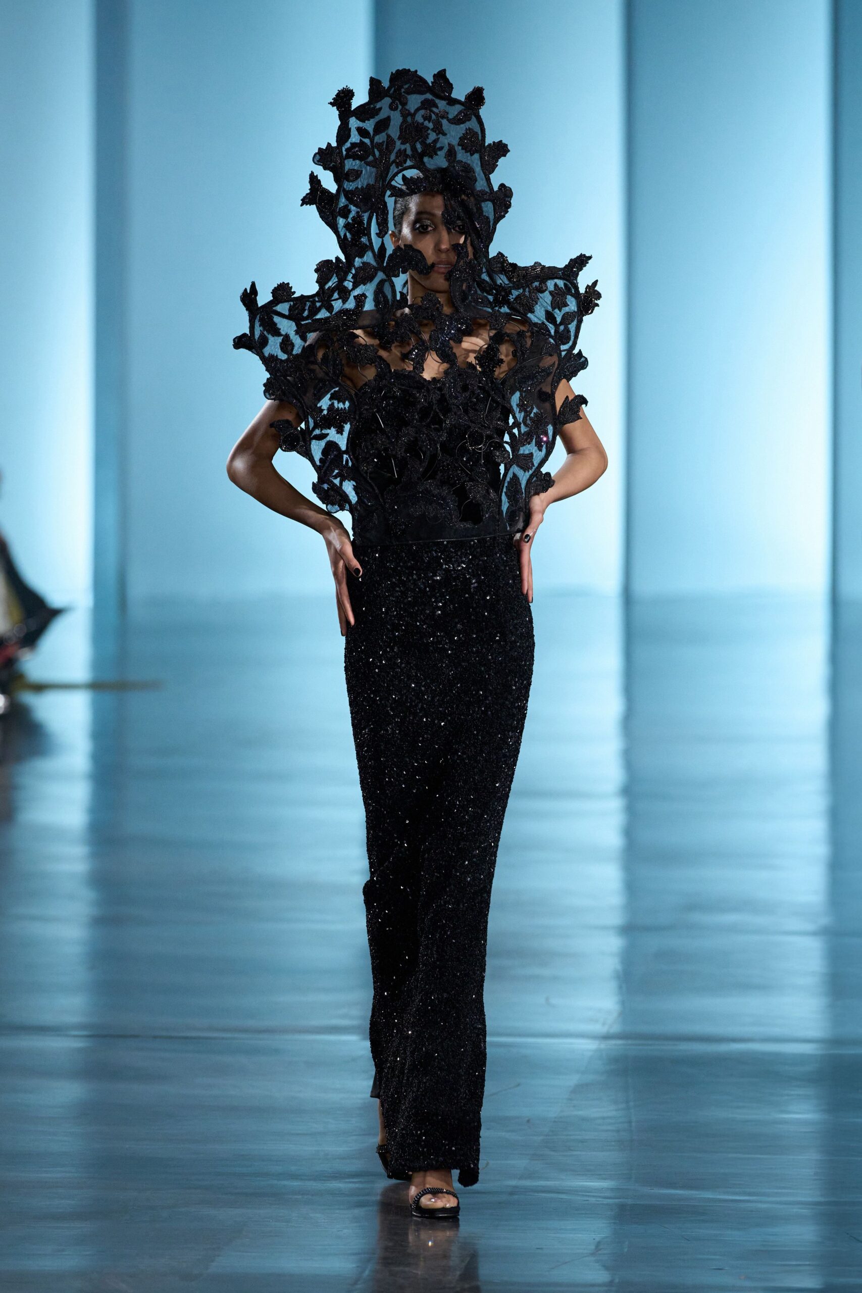 black embellished gown with headpiece