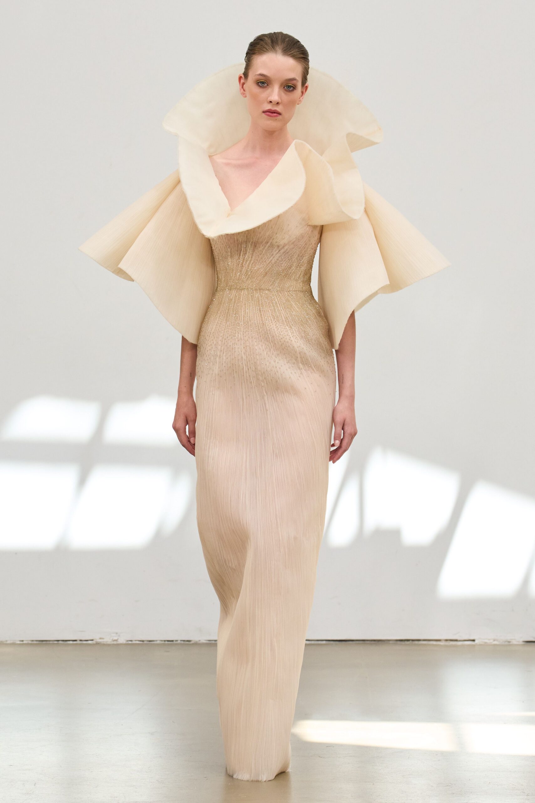 beige silk sleeveless gown