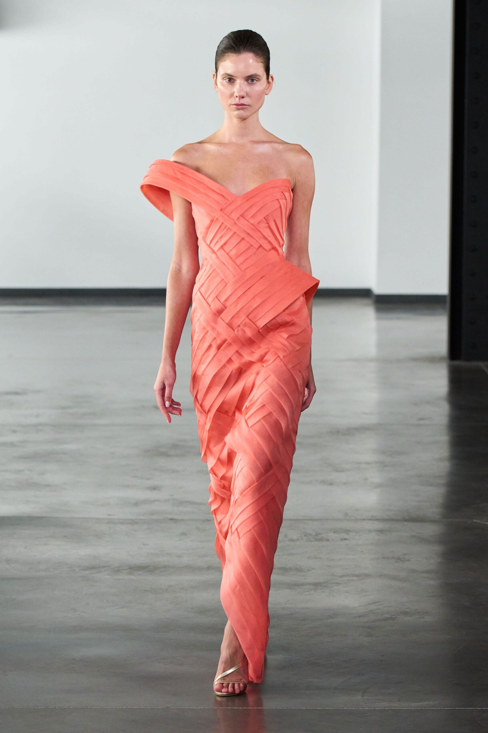 coral pleated strapless gown