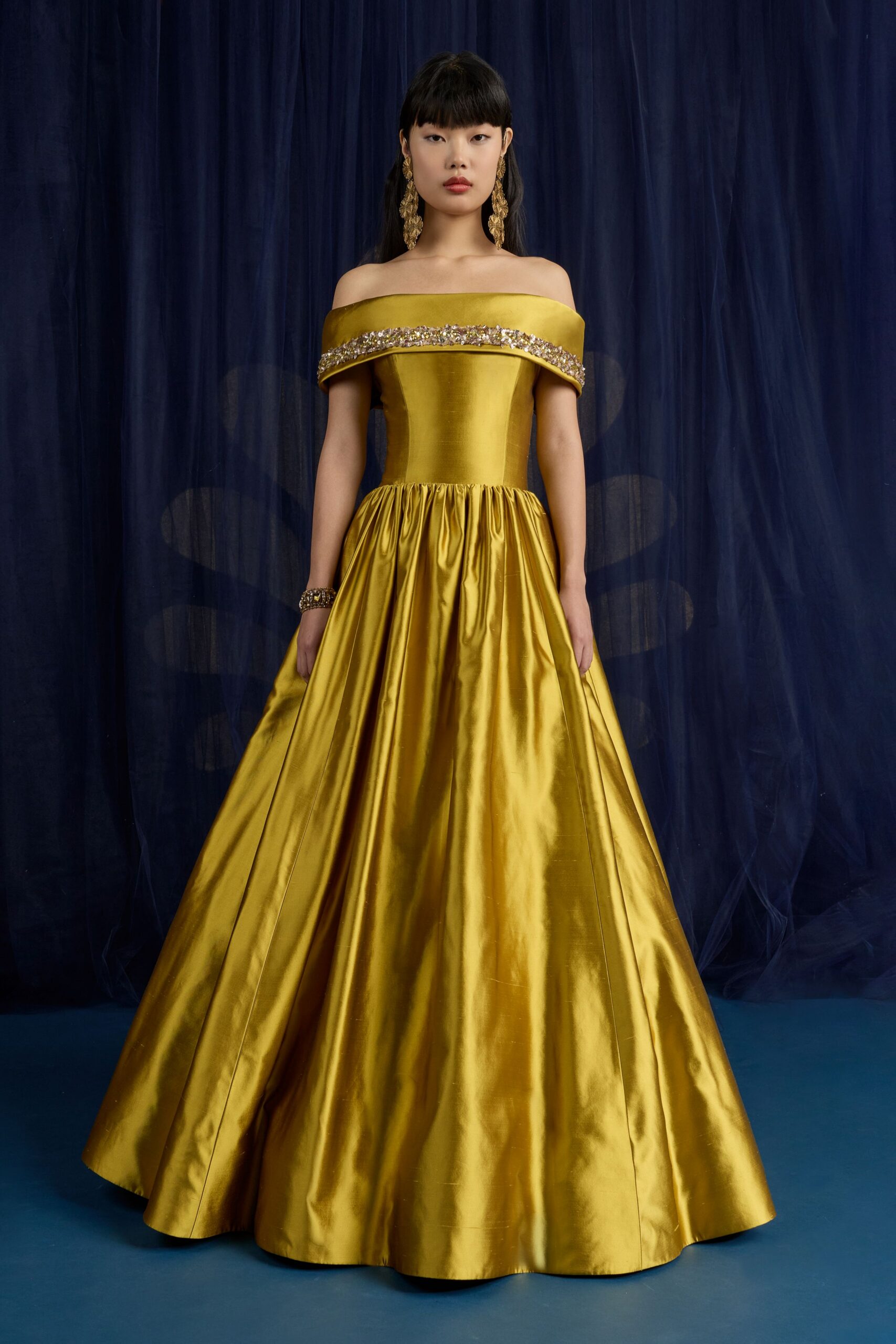 yellow silk off-shoulder gown