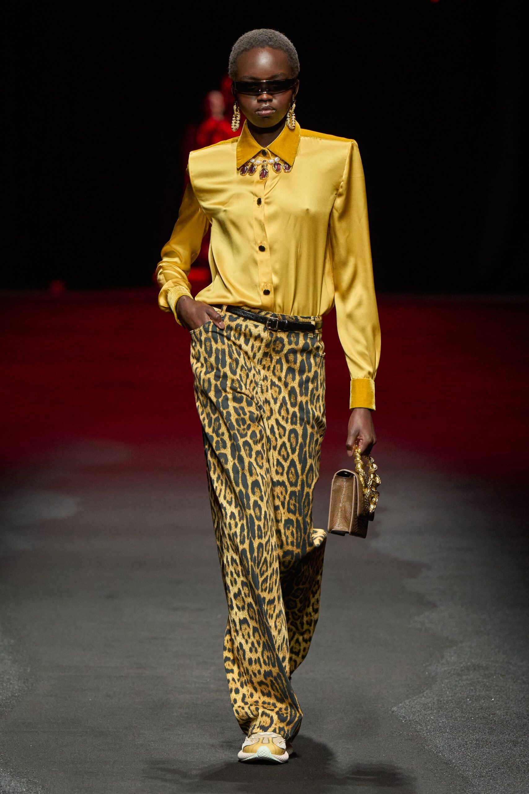 yellow silk shirt with animal-print pants