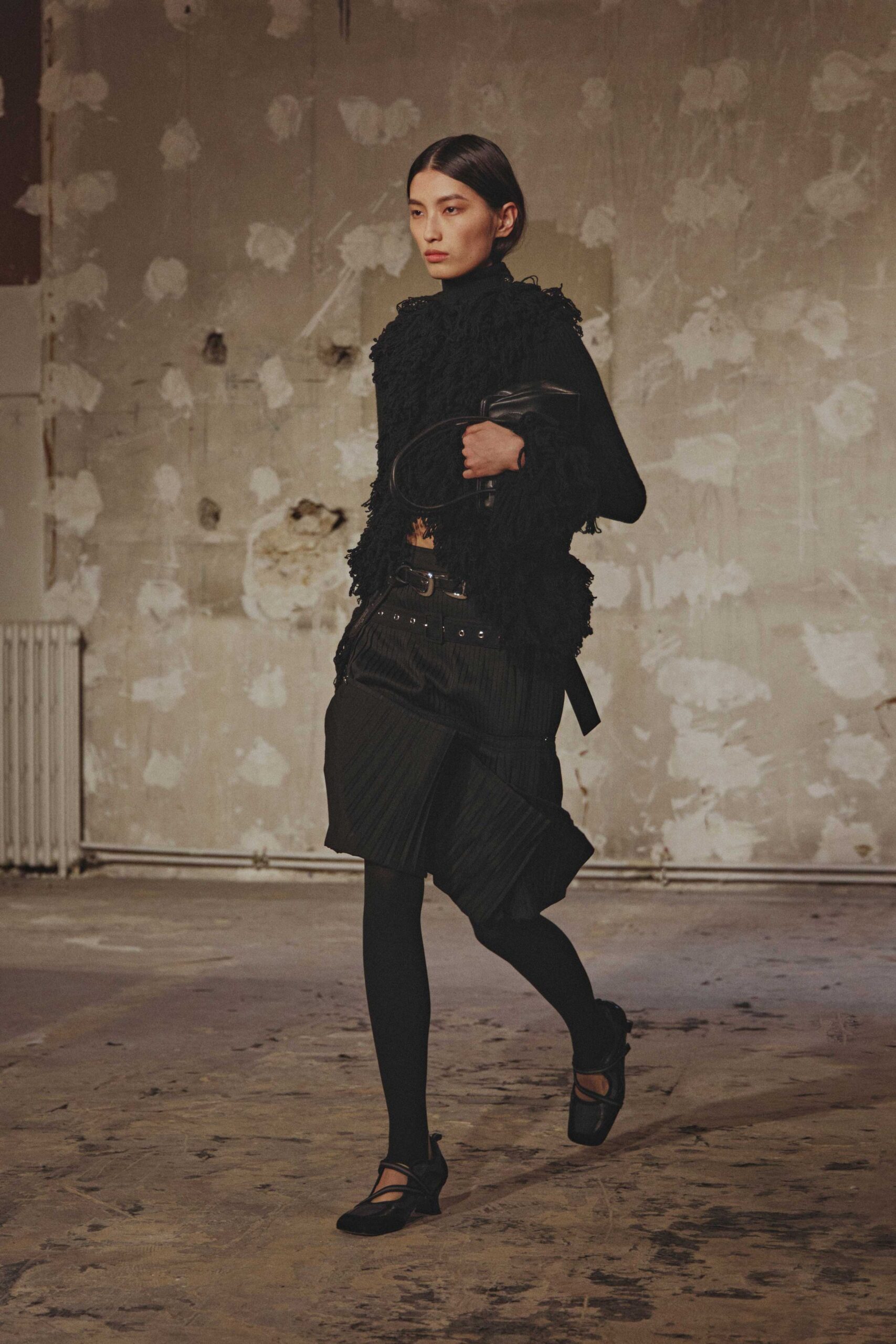 black wool long-sleeve high-neck fitted fringed top