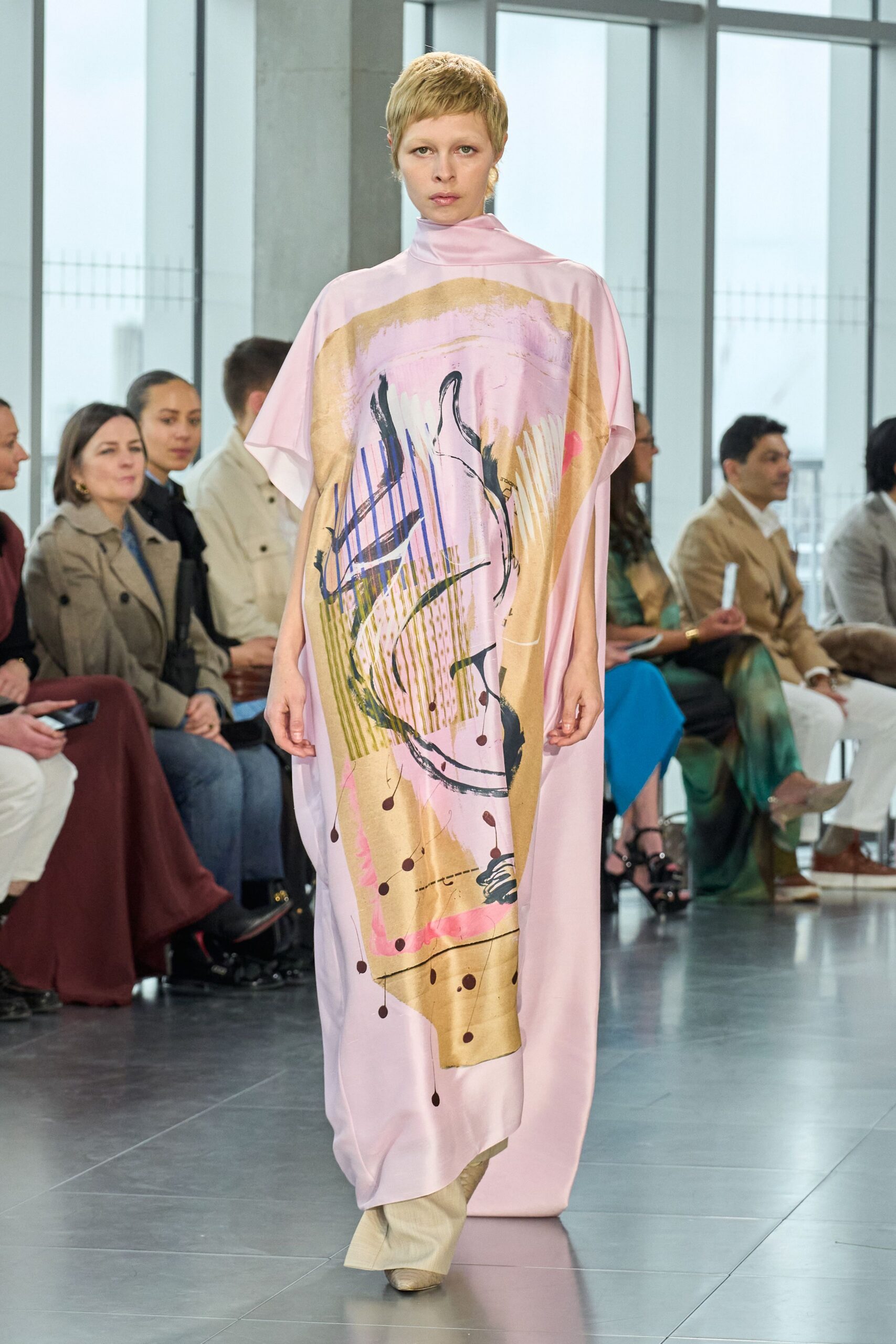 pink printed maxi dress with beige pants