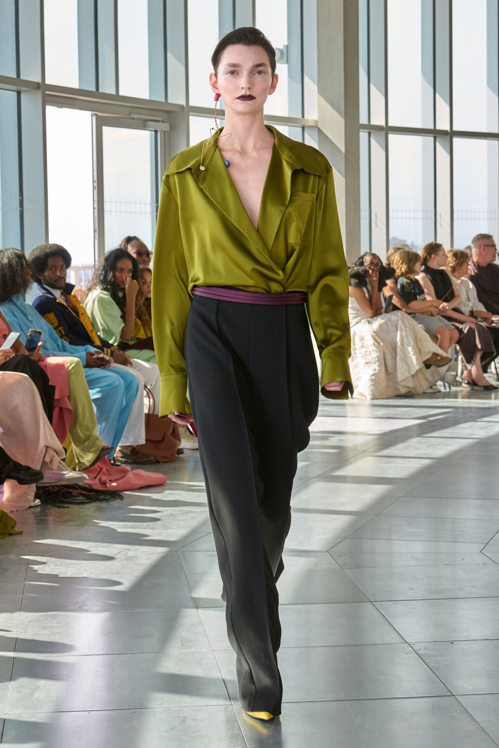 green silk shirt black tailored pants