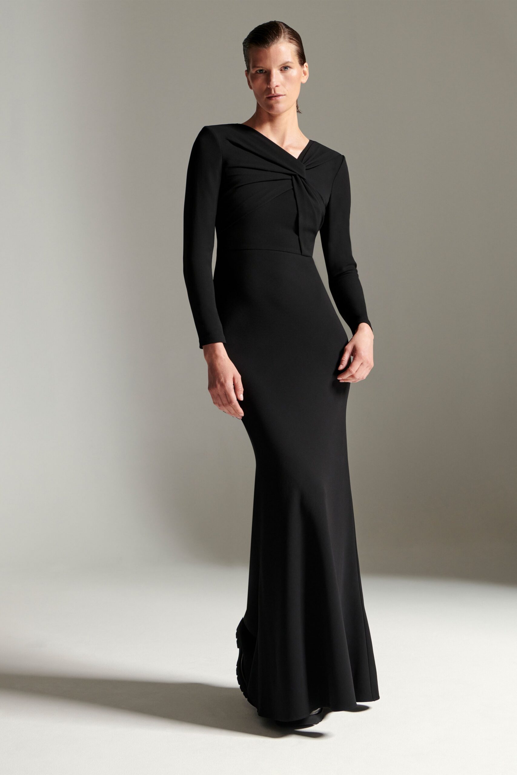 black fitted long-sleeve gown