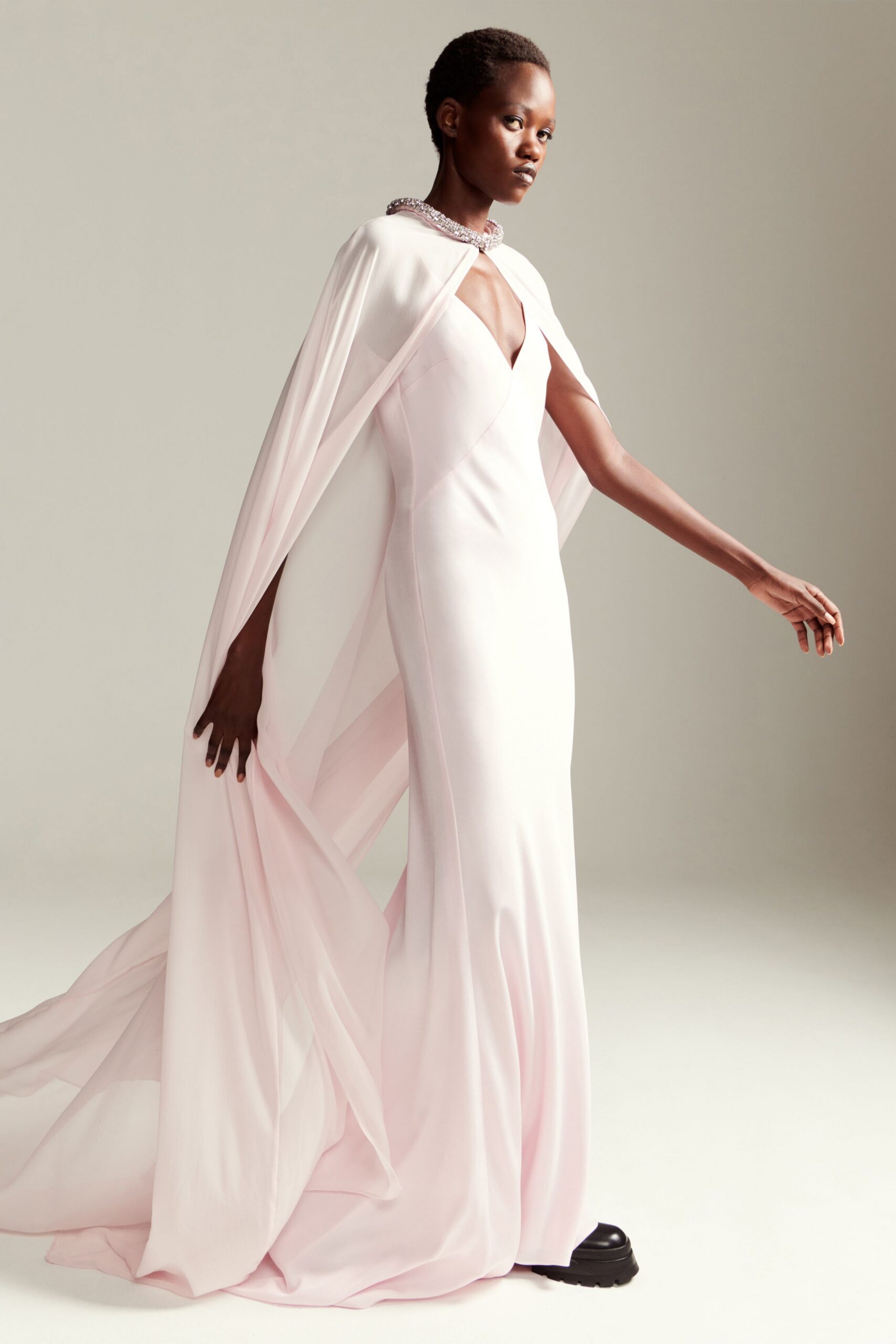 pink silk sleeveless v-neck fitted draped flowing gown