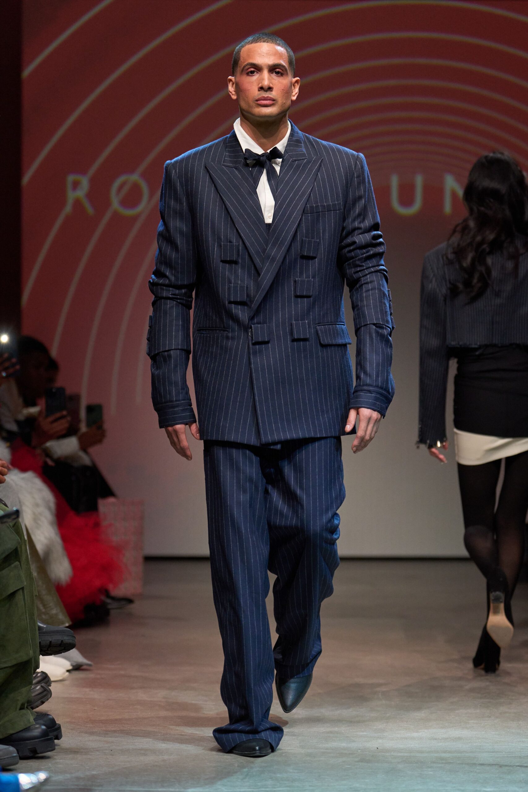 blue tailored suit with shiny shoes