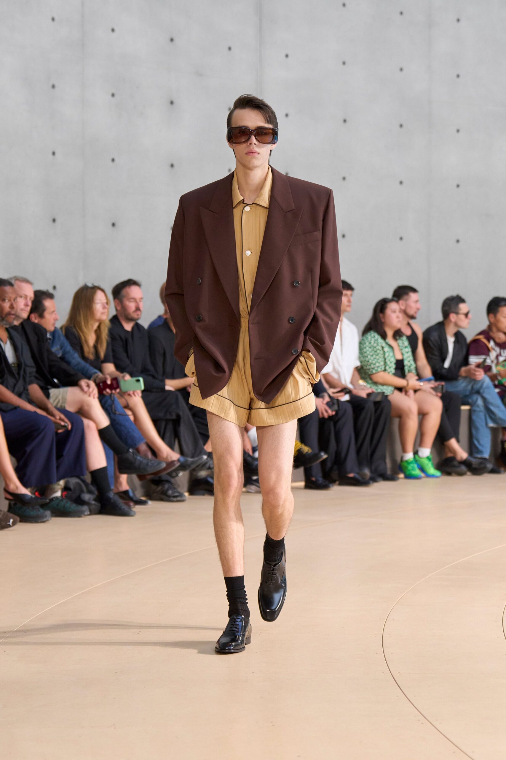 oversized brown blazer with beige shirt and shorts