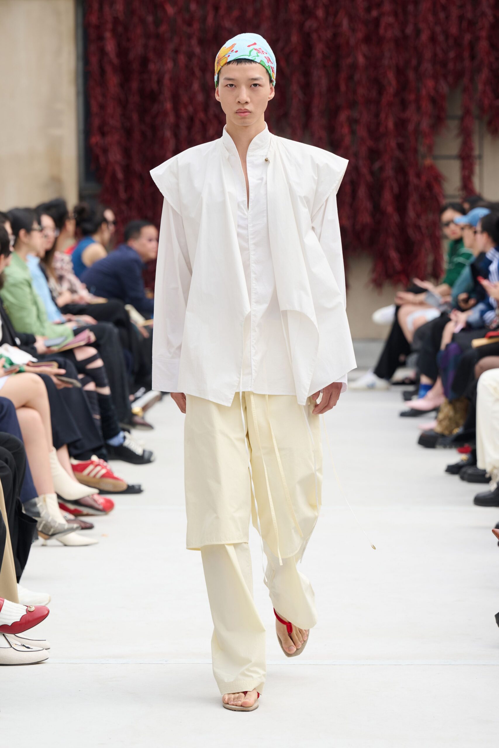white relaxed shirt with beige pants