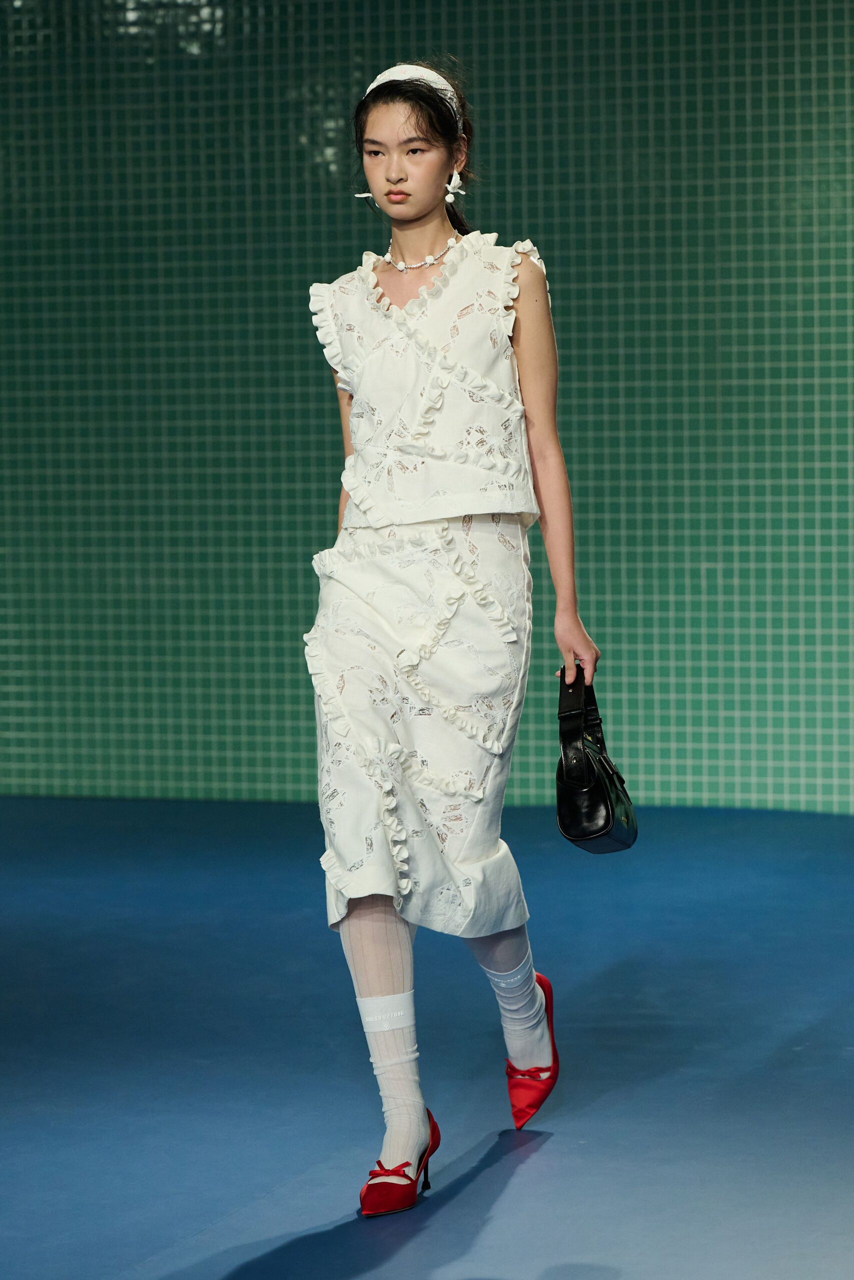 white ruffled top and midi skirt