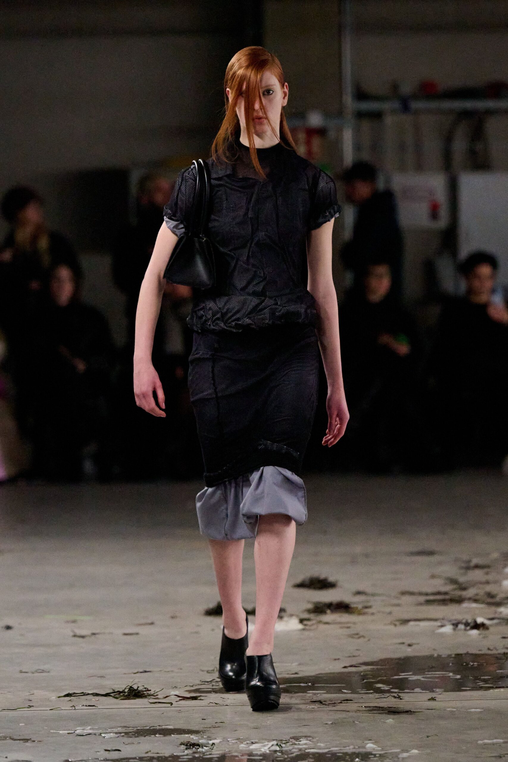 black fitted midi dress with bag