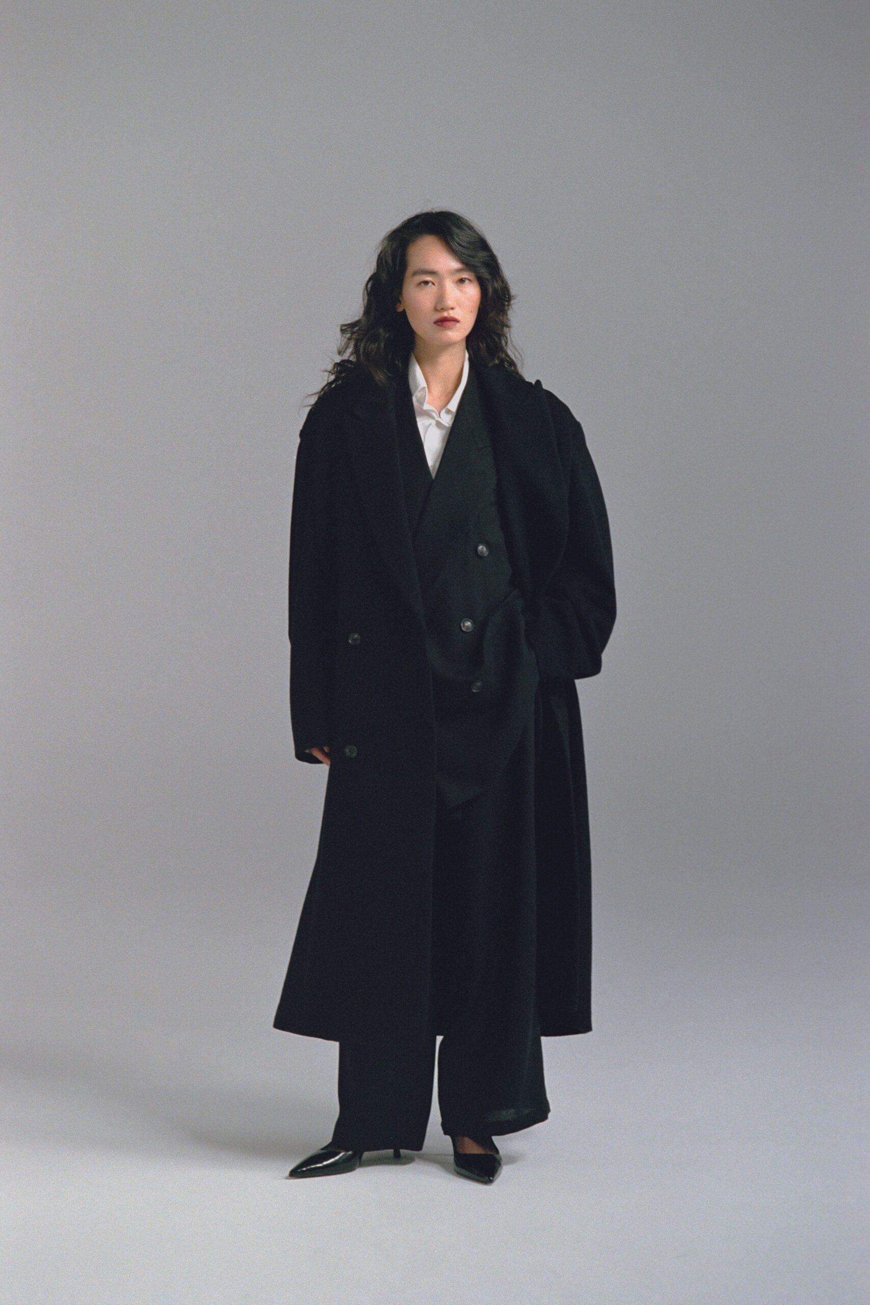 black wool coat and tailored blazer