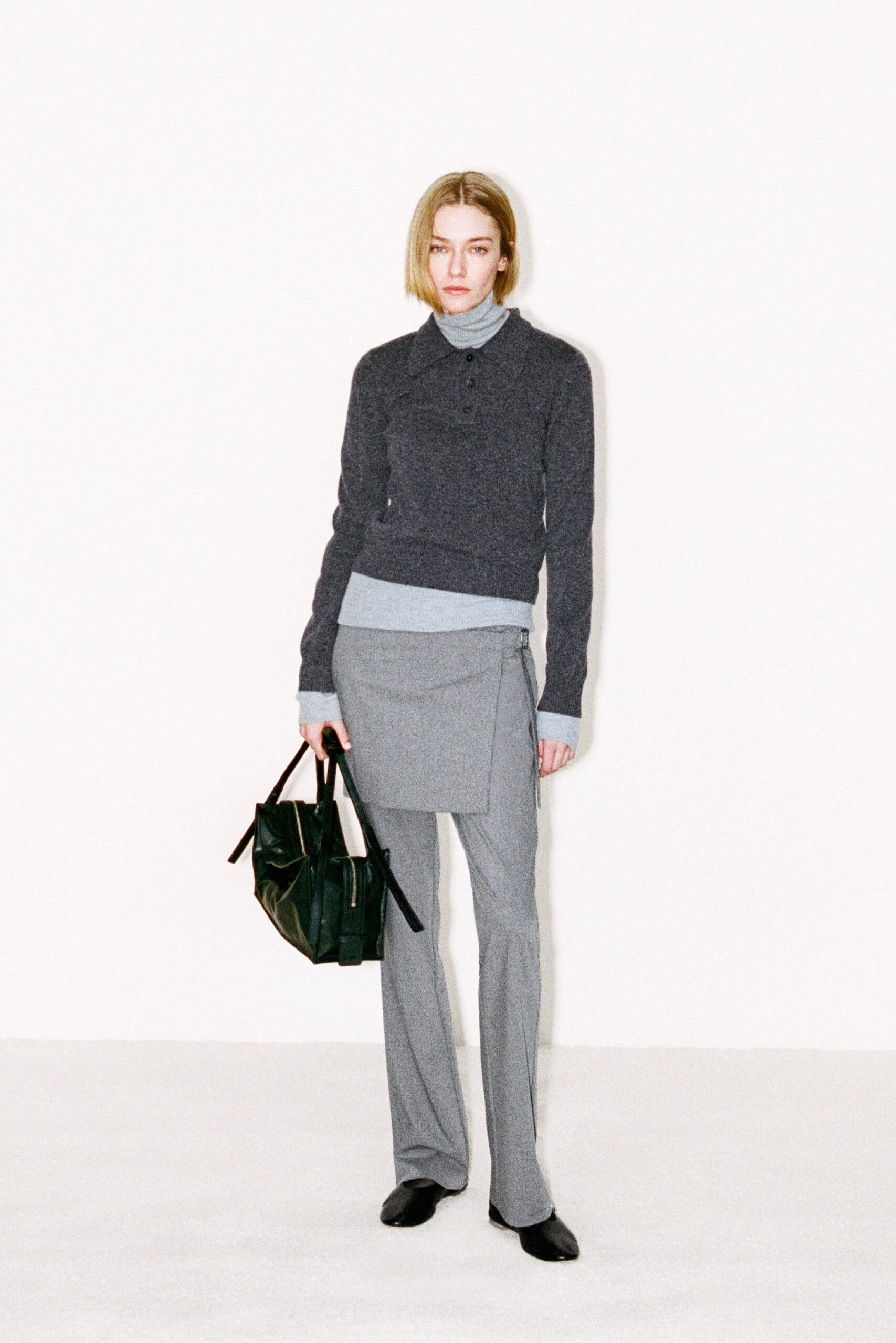 gray wool sweater with blue top