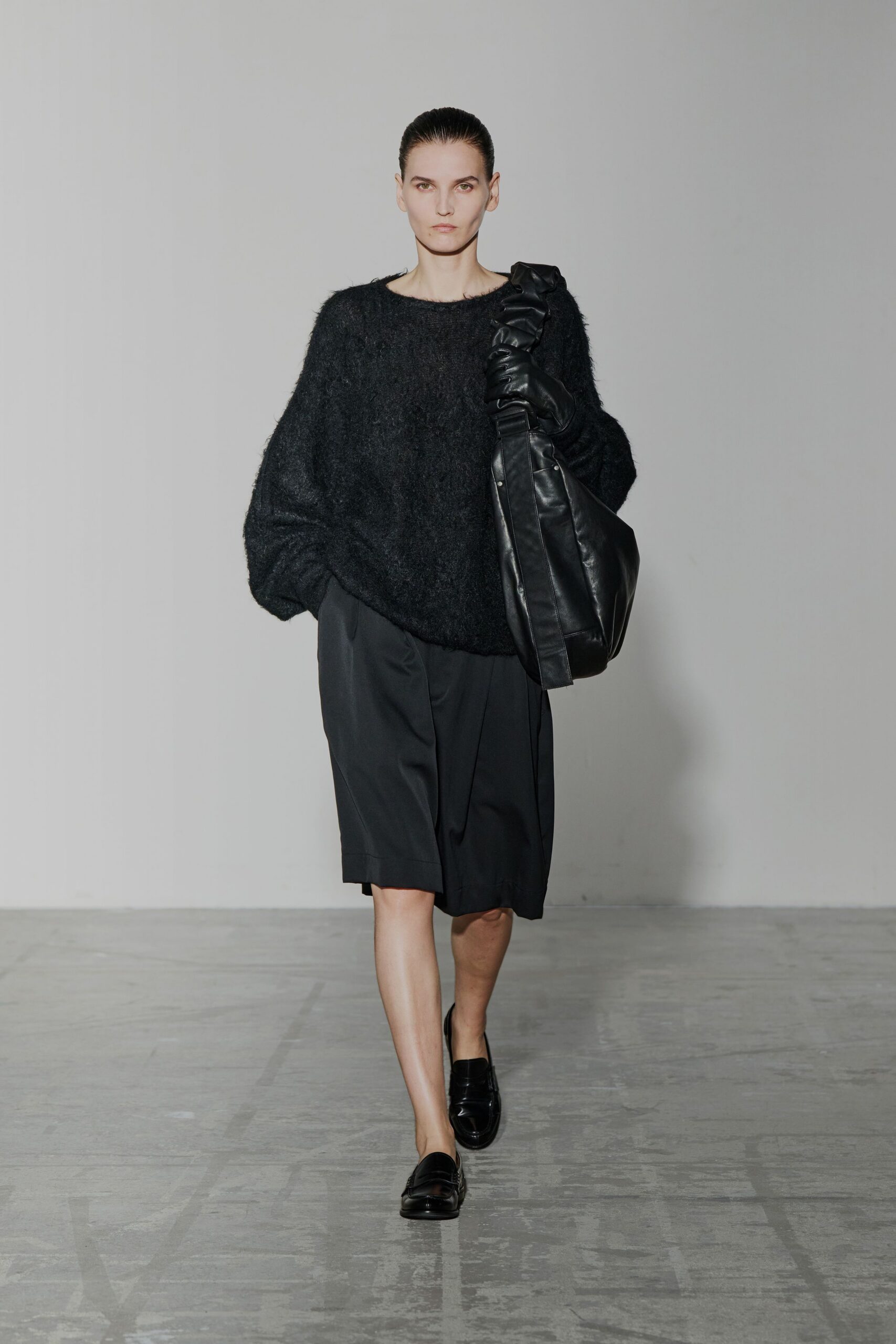 black oversized wool top with shorts