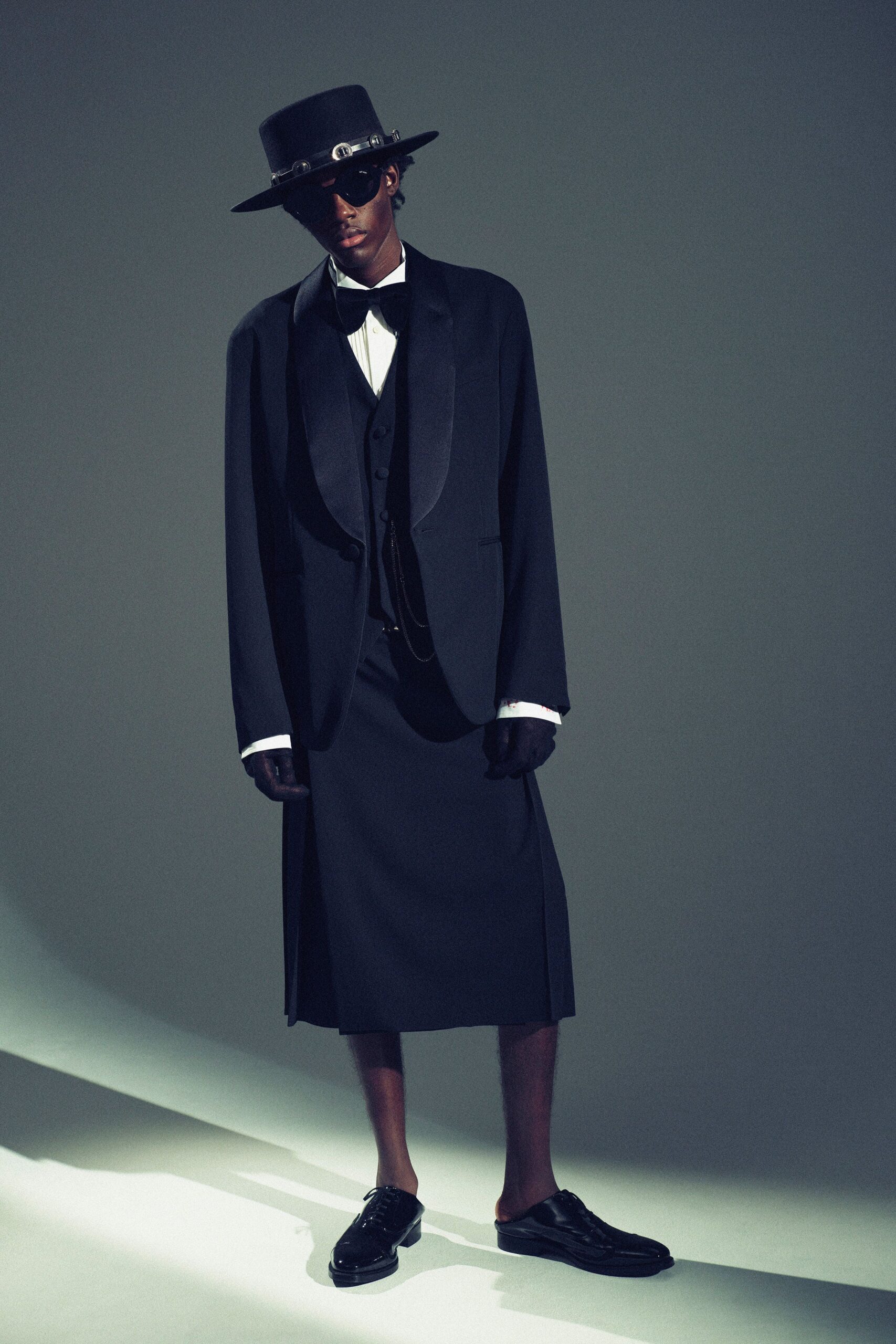 black suit with skirt and accessories