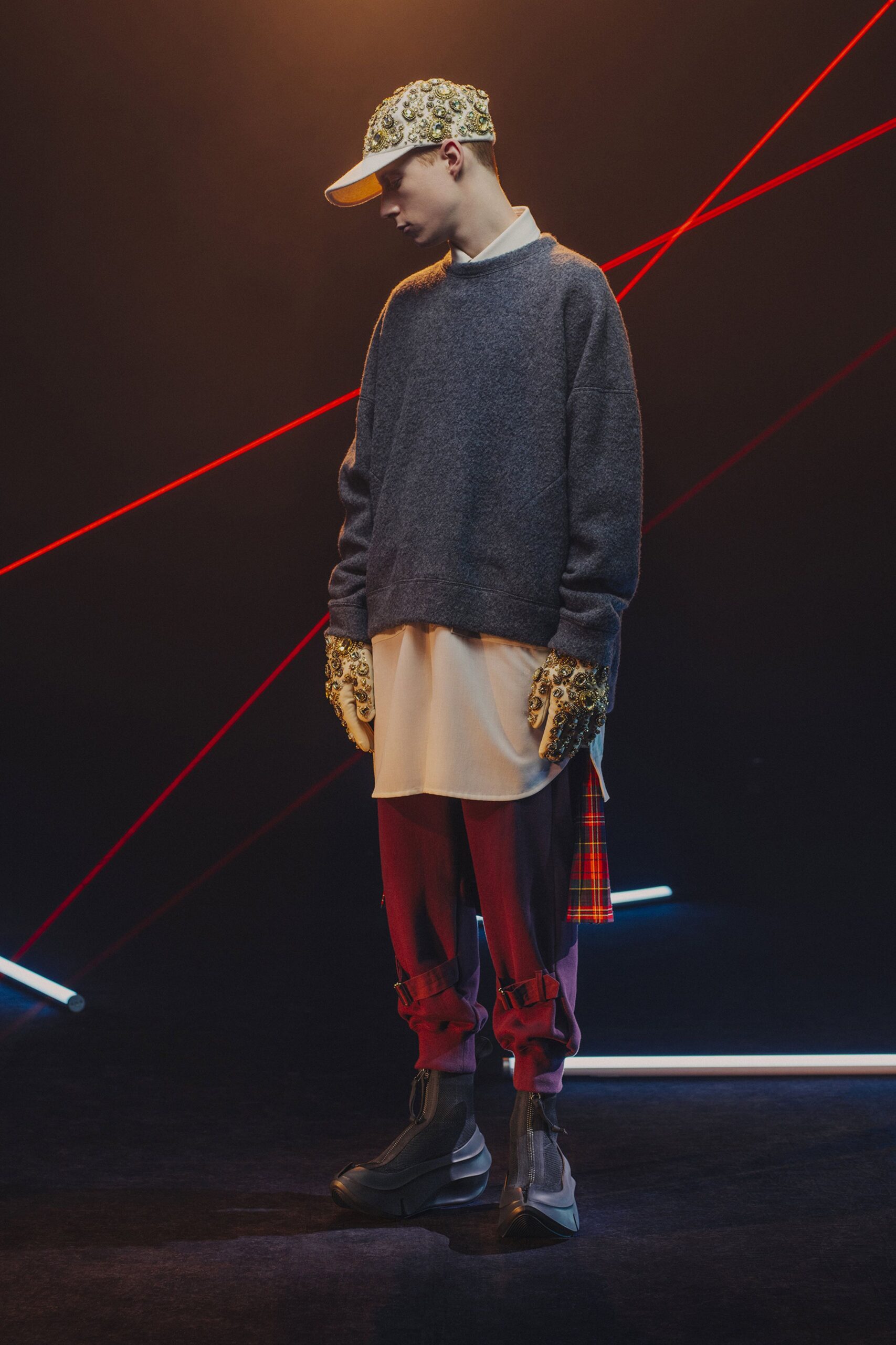 gray sweater white shirt red pants