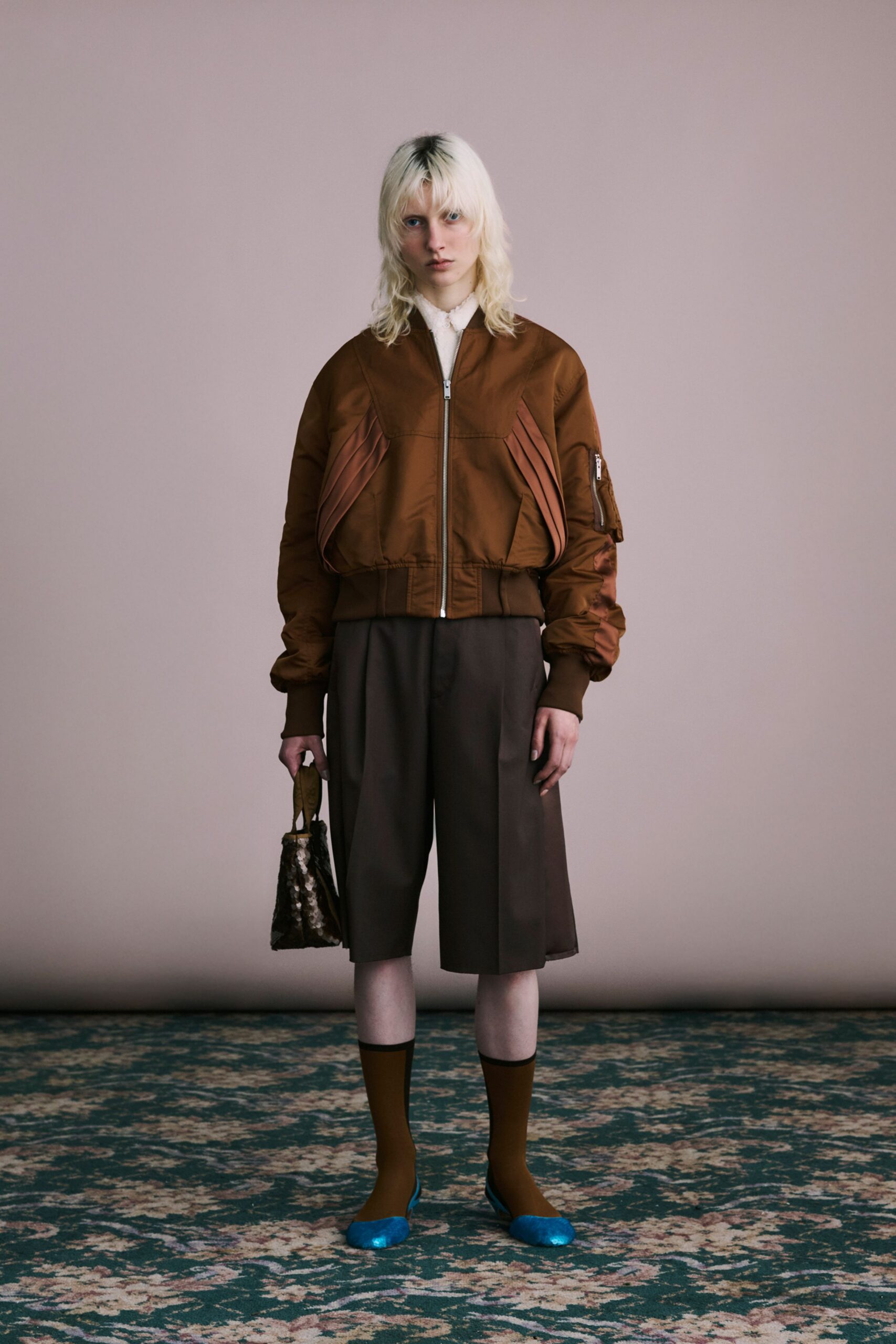 brown fitted jacket with shorts