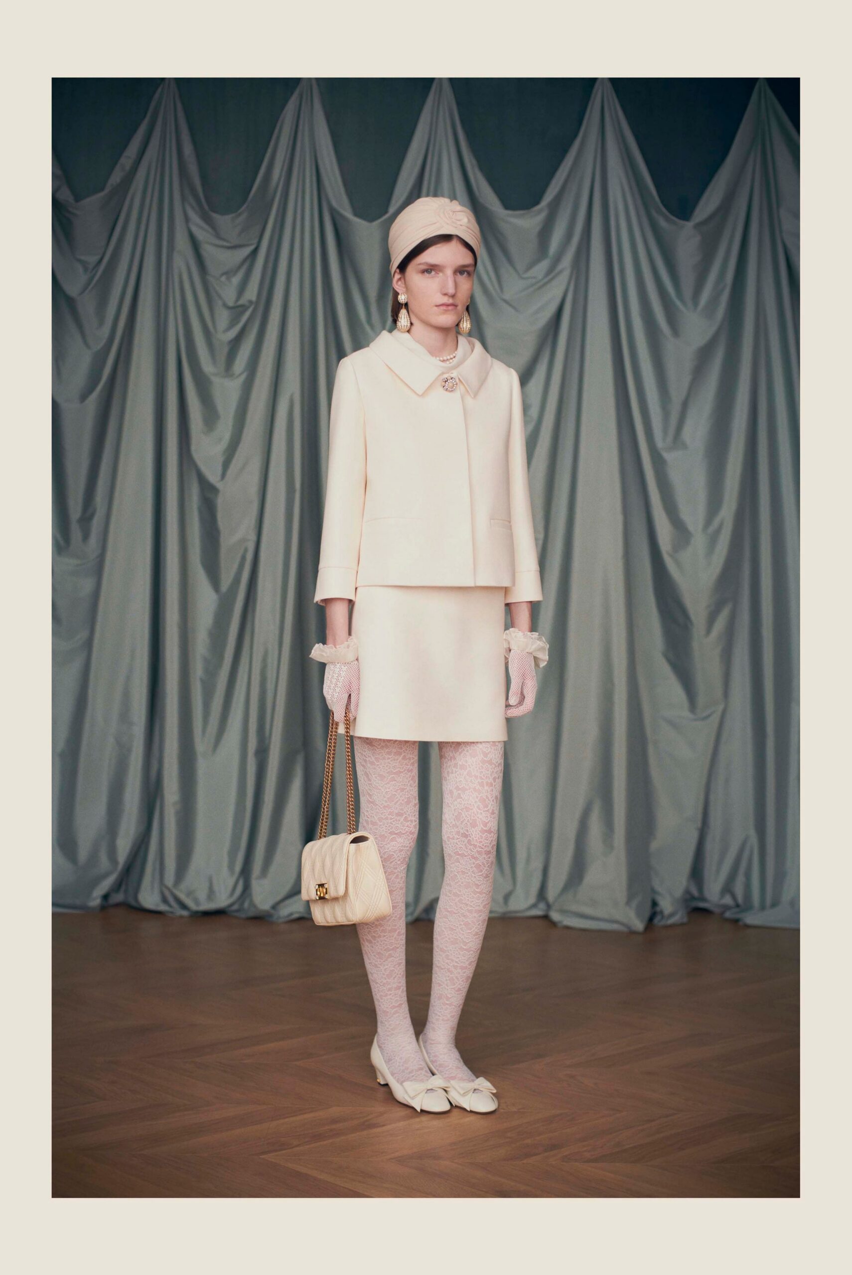 white cotton long-sleeve collared structured buttoned cropped jacket