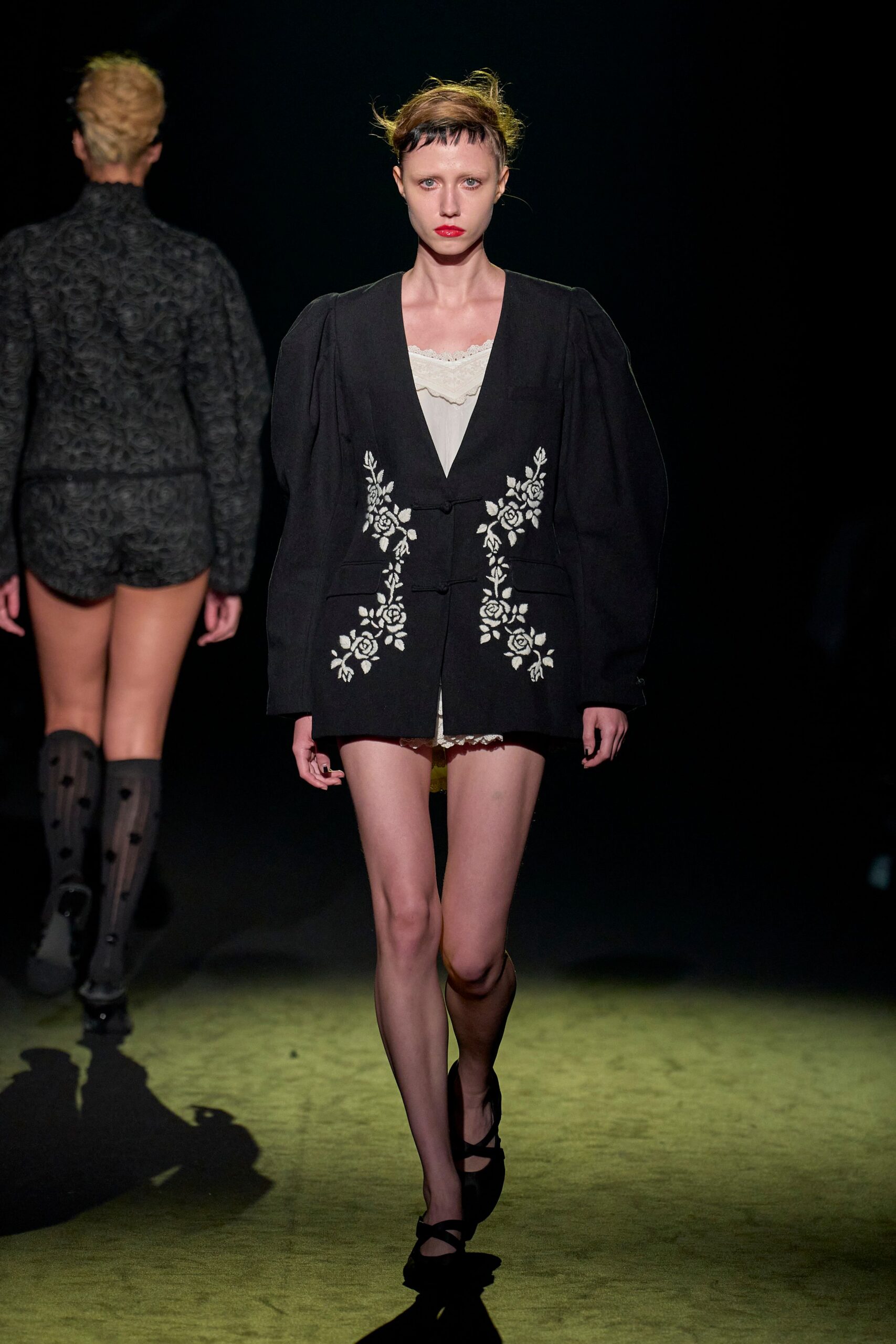 black fitted blazer with embroidered detail