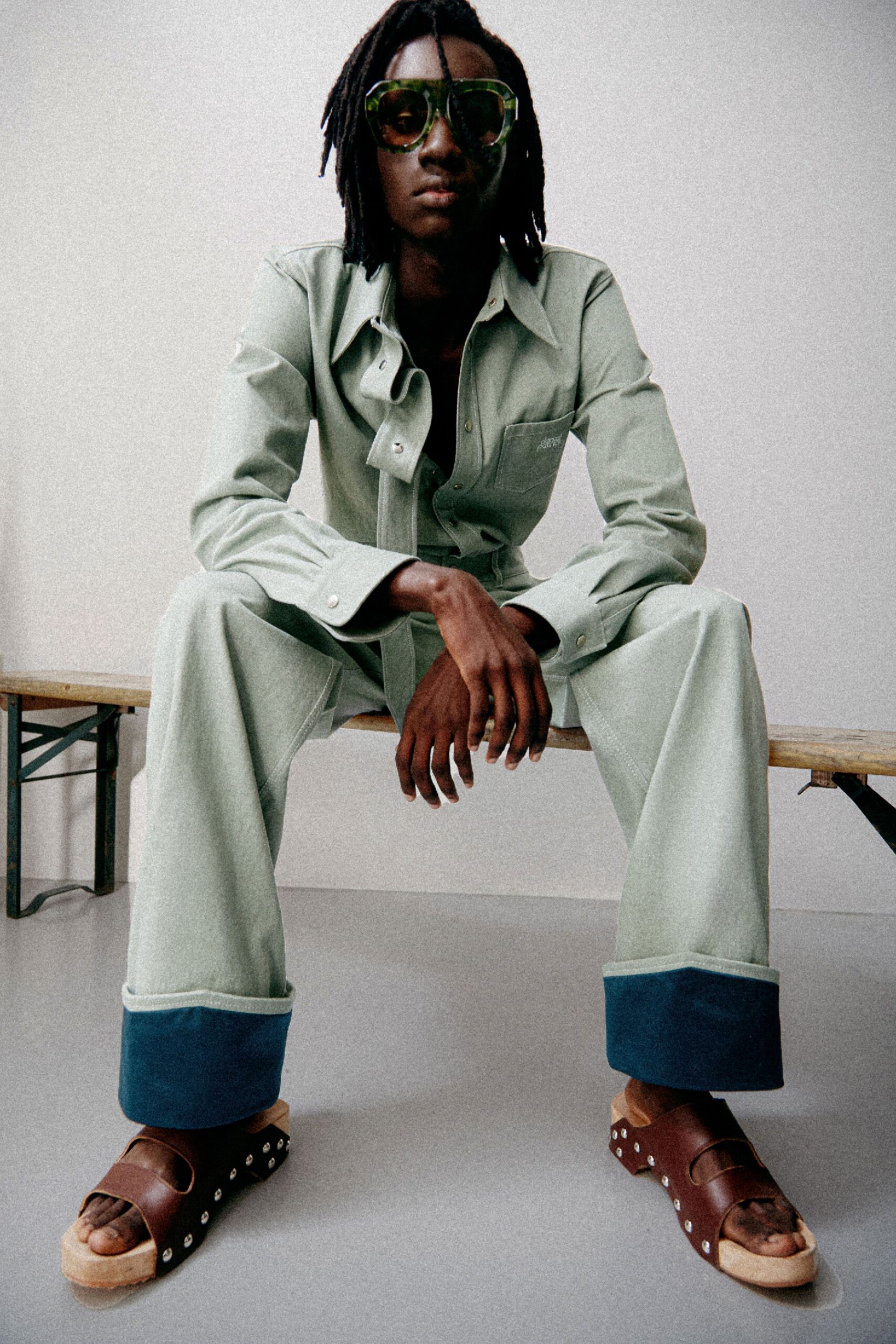 green cotton long-sleeve collared relaxed buttoned jumpsuit