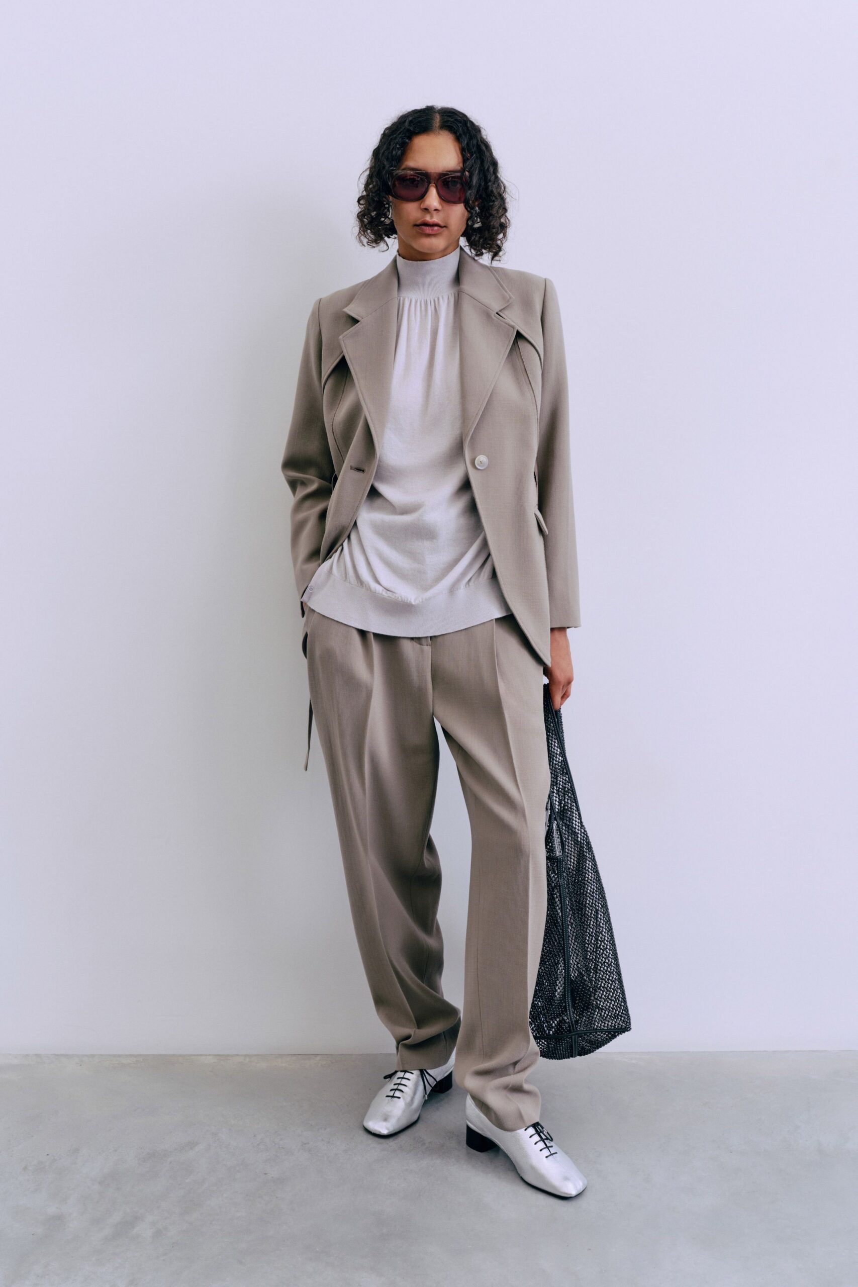 beige tailored blazer with white top
