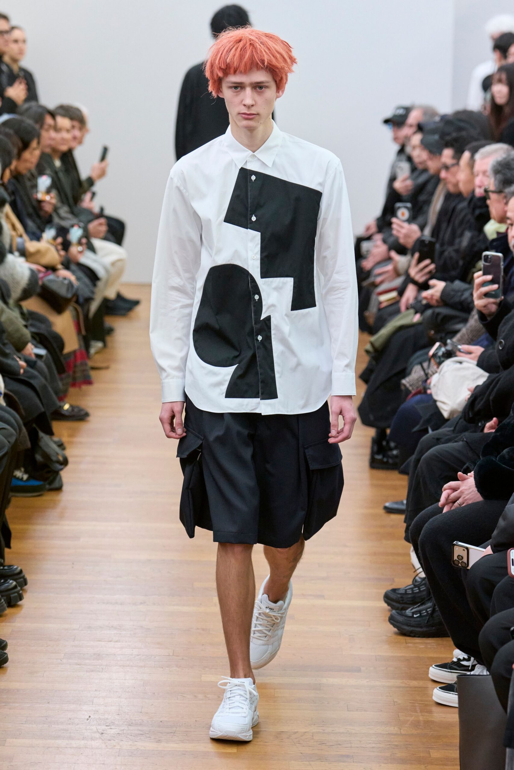 white shirt black cargo shorts