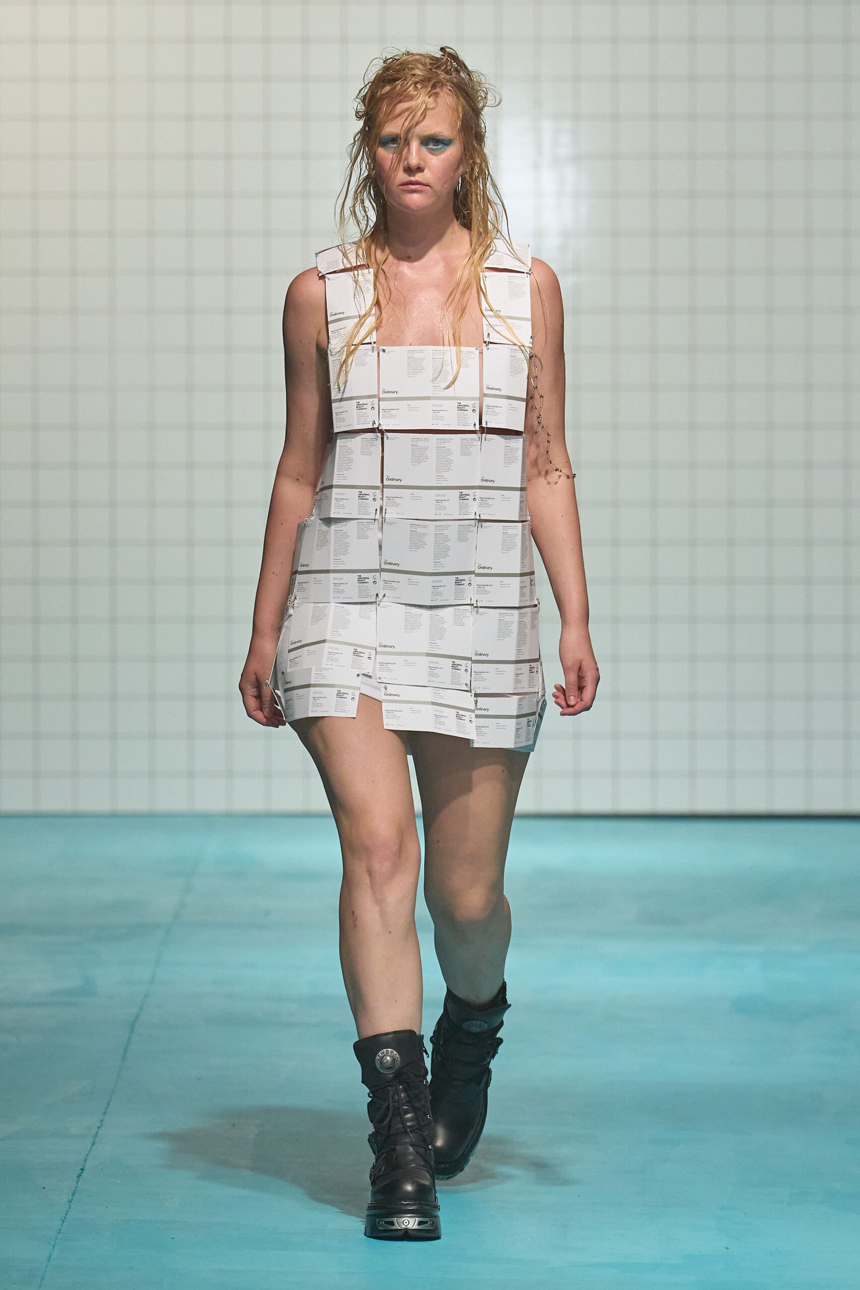 white layered mini dress with black boots