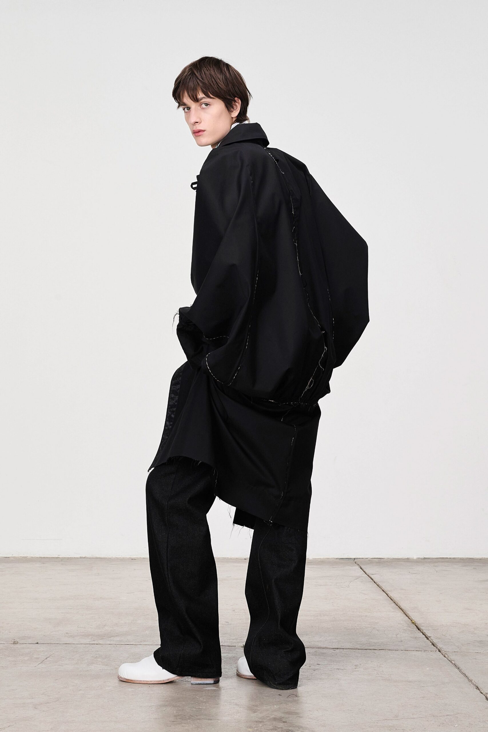 oversized black coat with relaxed pants