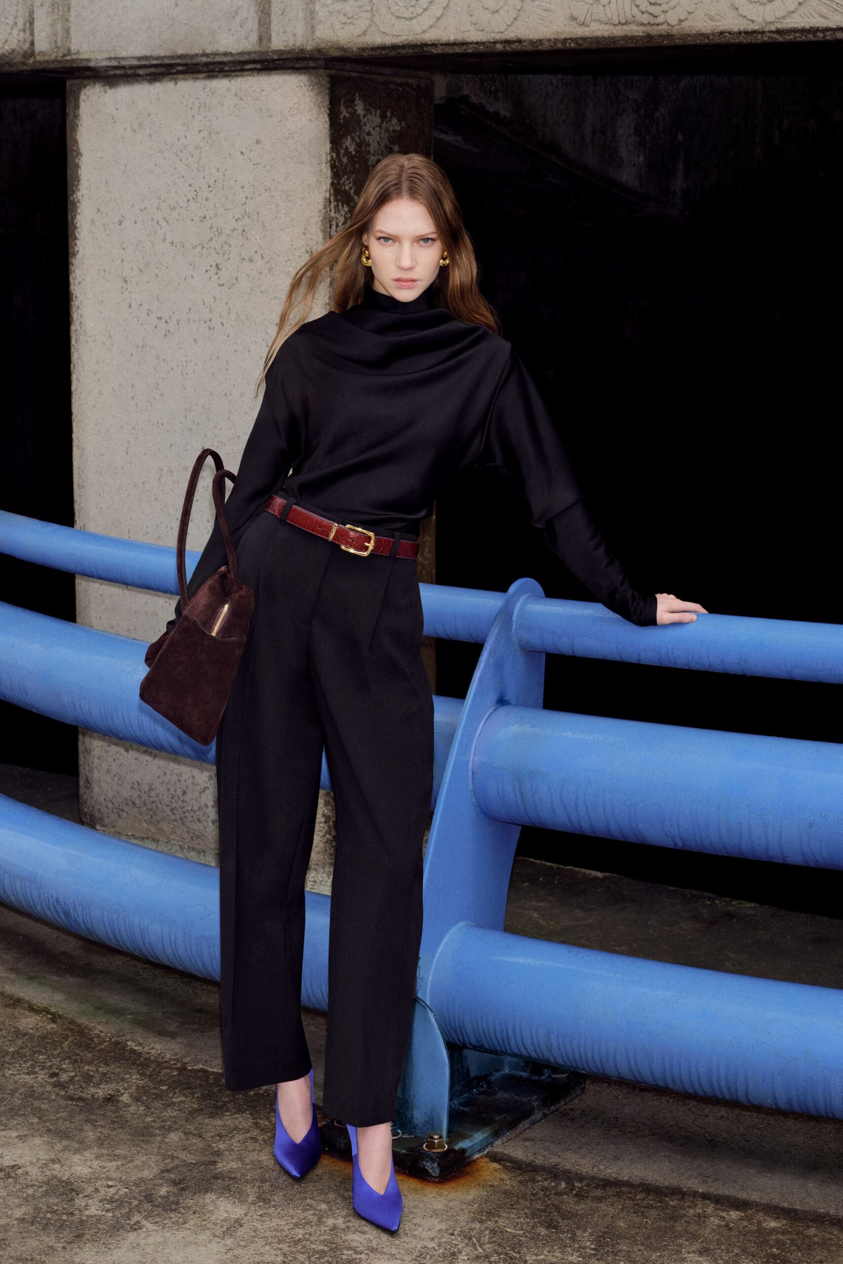 black fitted top with tailored pants
