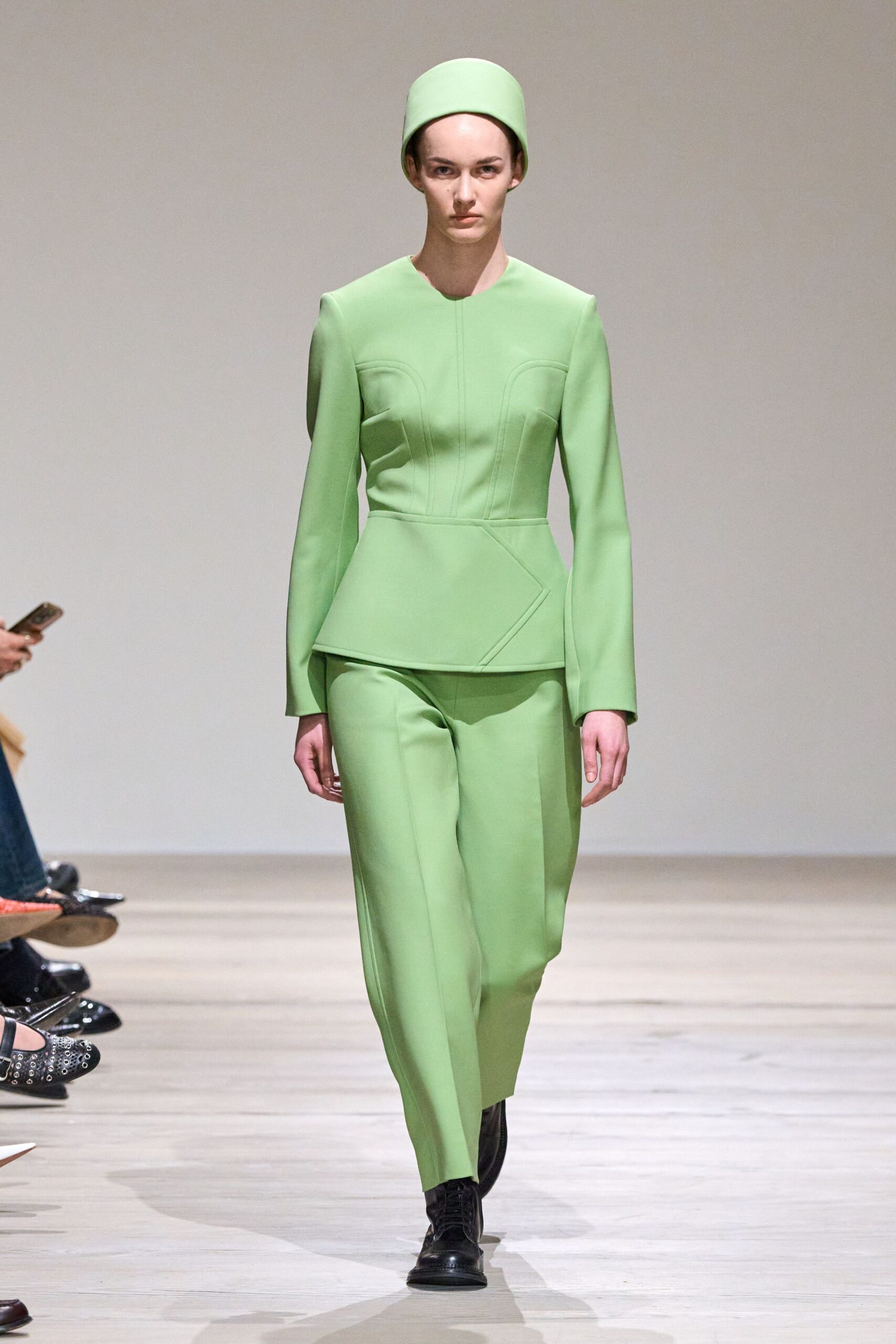 green neoprene long-sleeve collared structured zippered suit