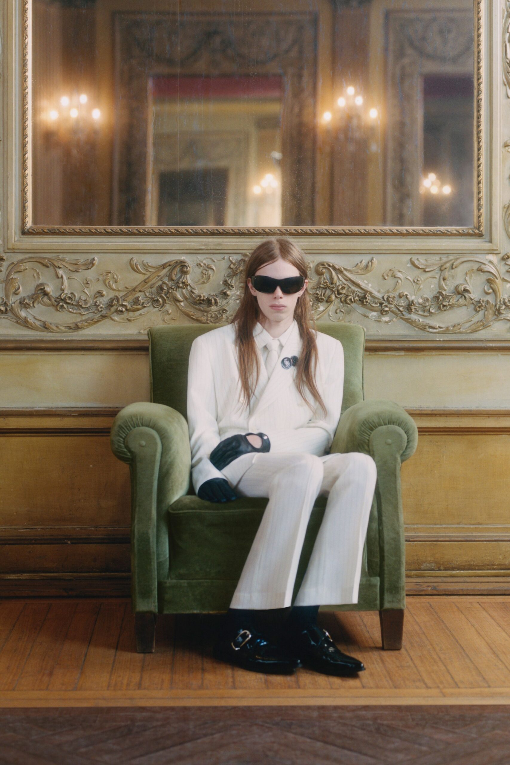 white tailored suit with black accessories