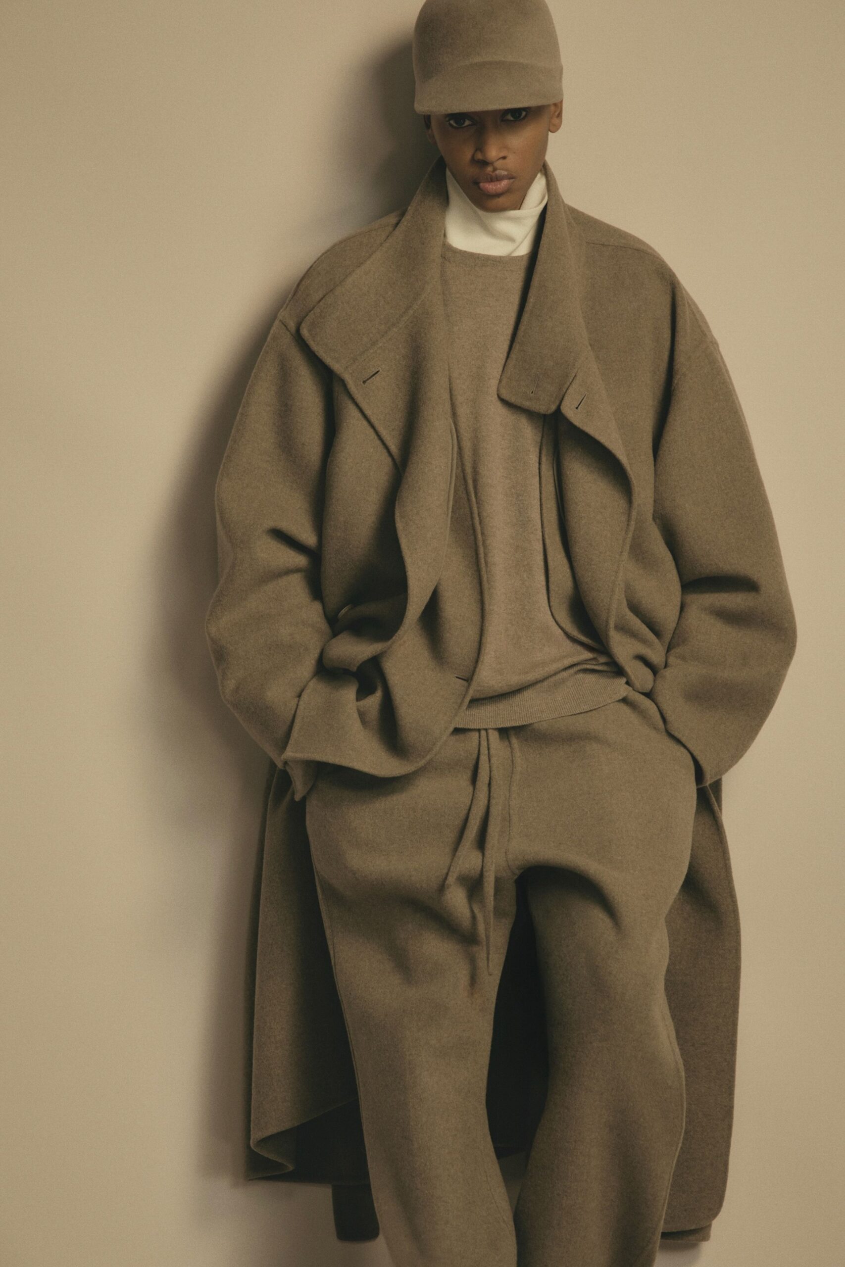 beige oversized wool coat and sweater