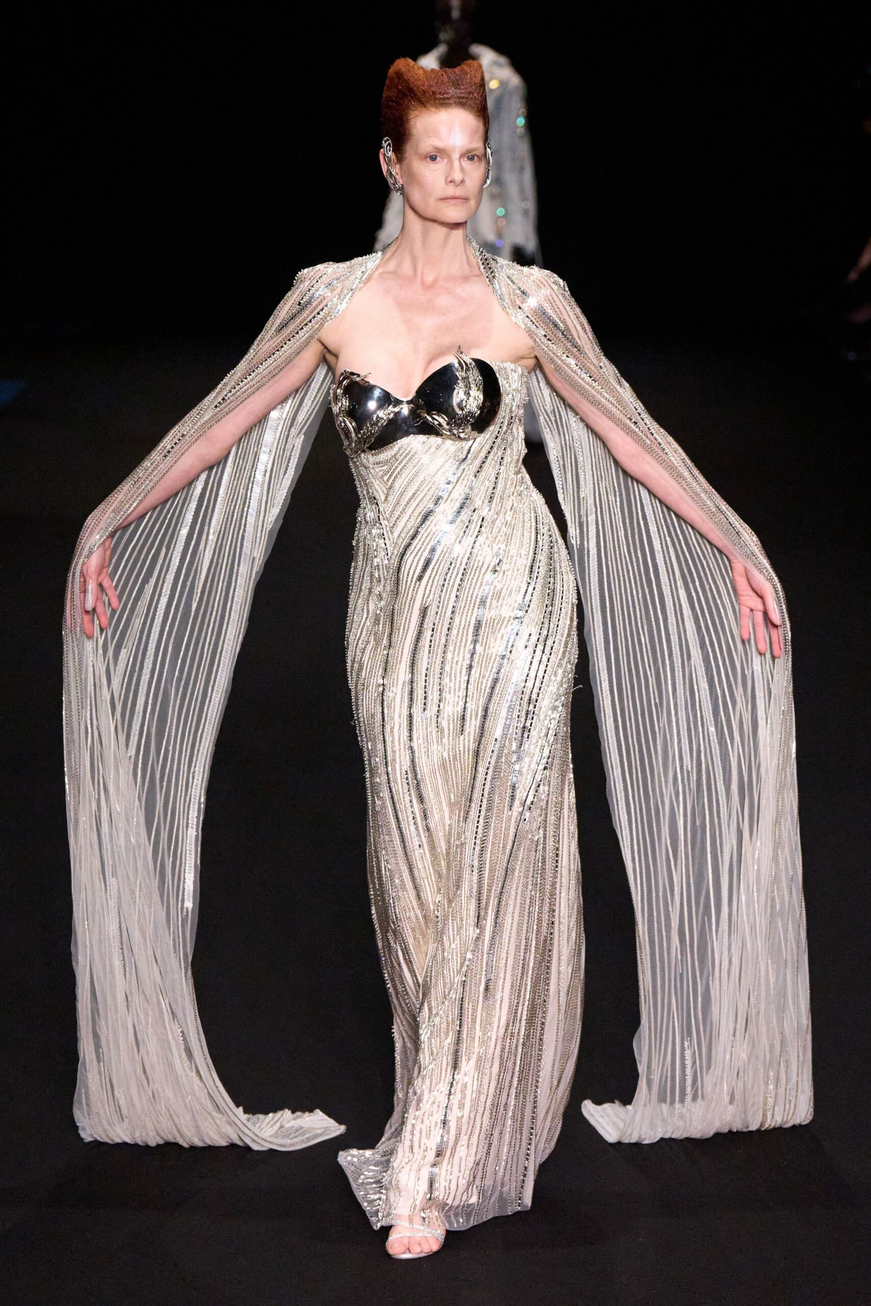 silver sequined sleeveless gown