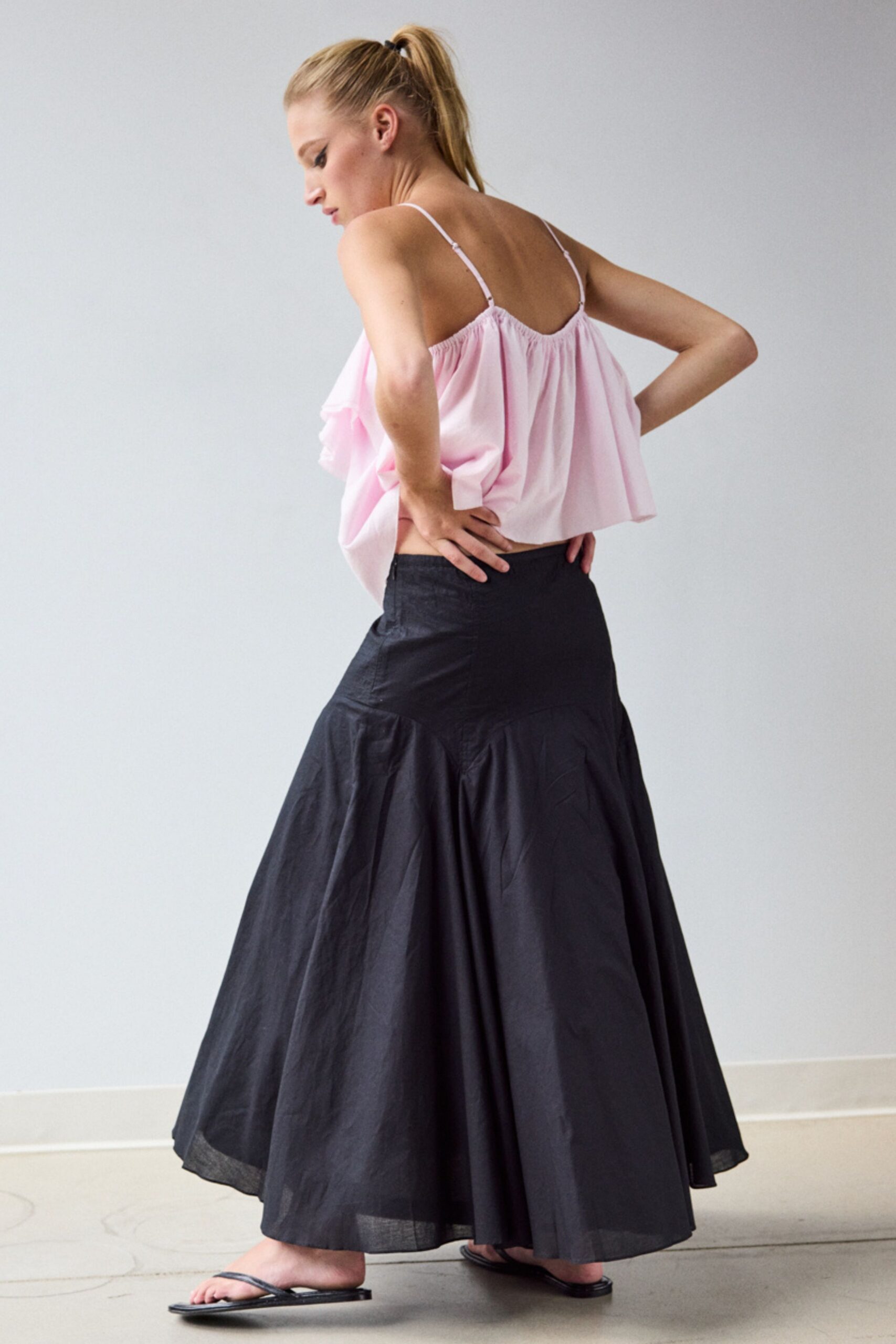 black cotton fitted high-waisted flared midi skirt