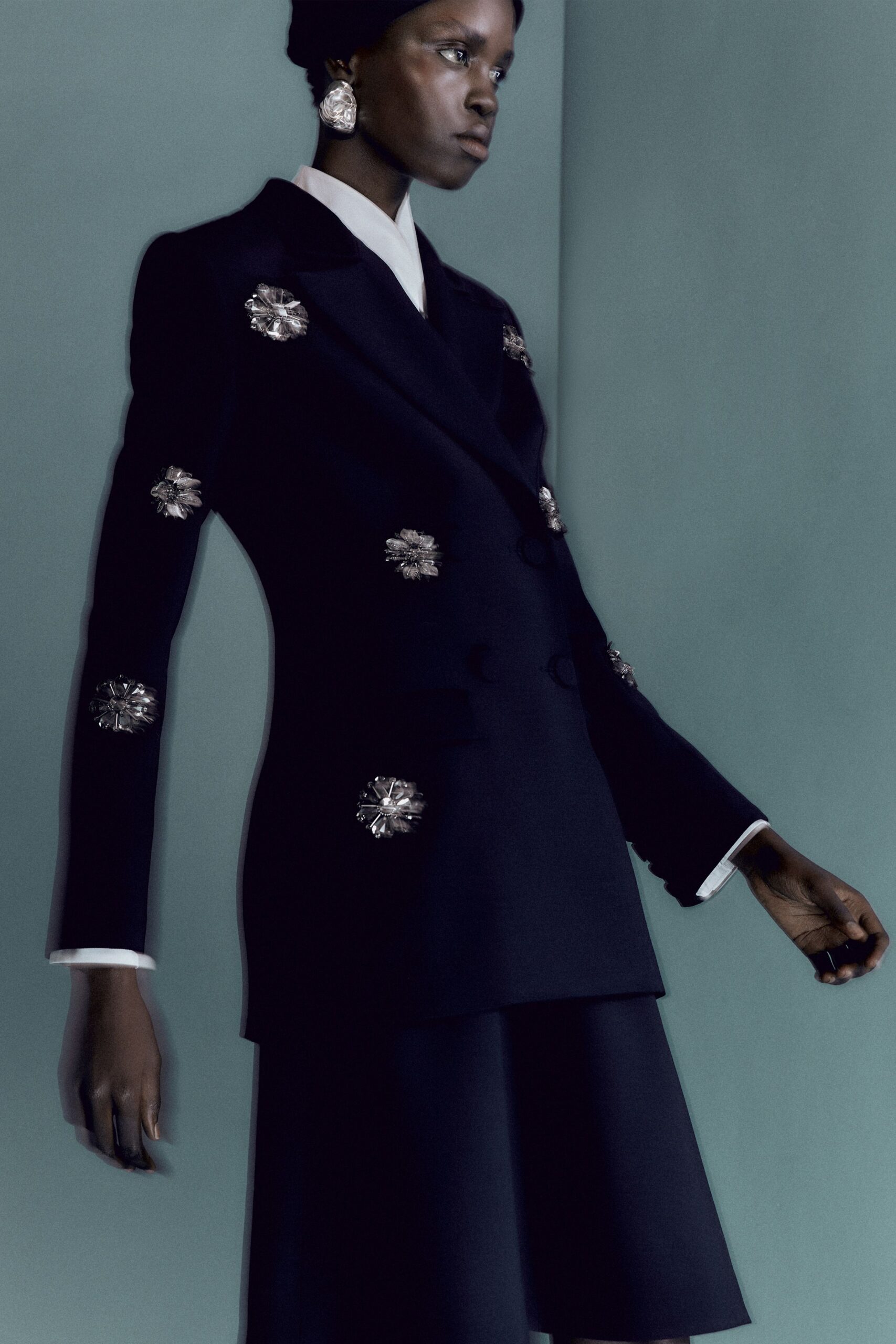 black embroidered blazer and skirt