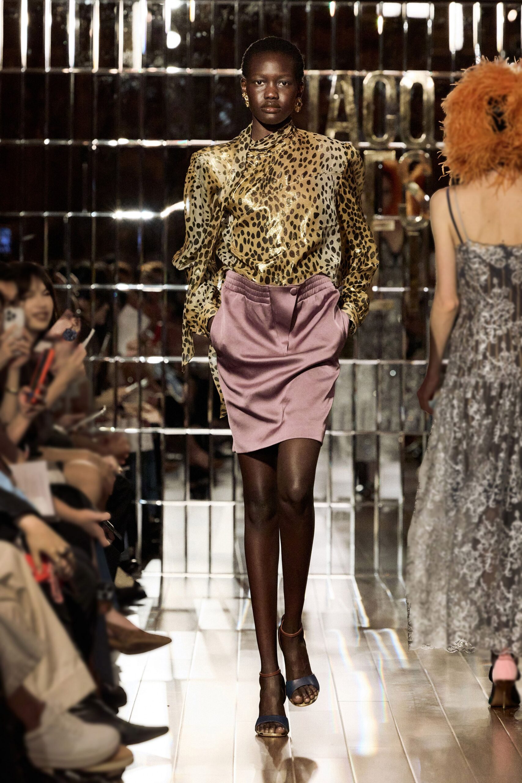 gold animal-print shirt with pink pencil skirt