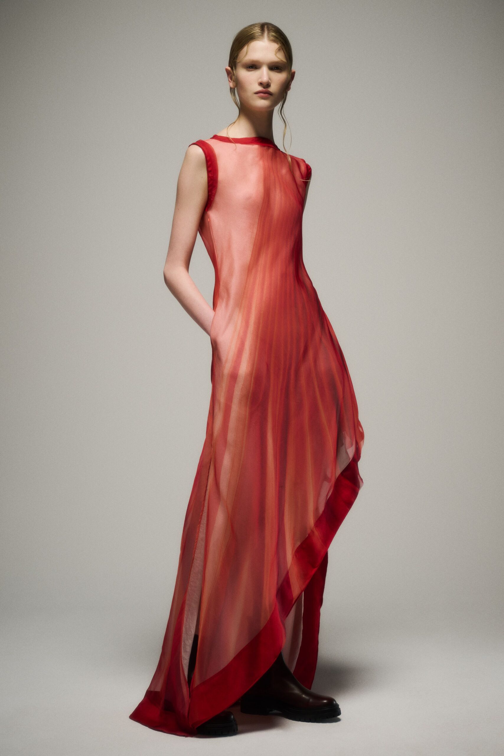 red silk sleeveless high-neck fitted layered gown