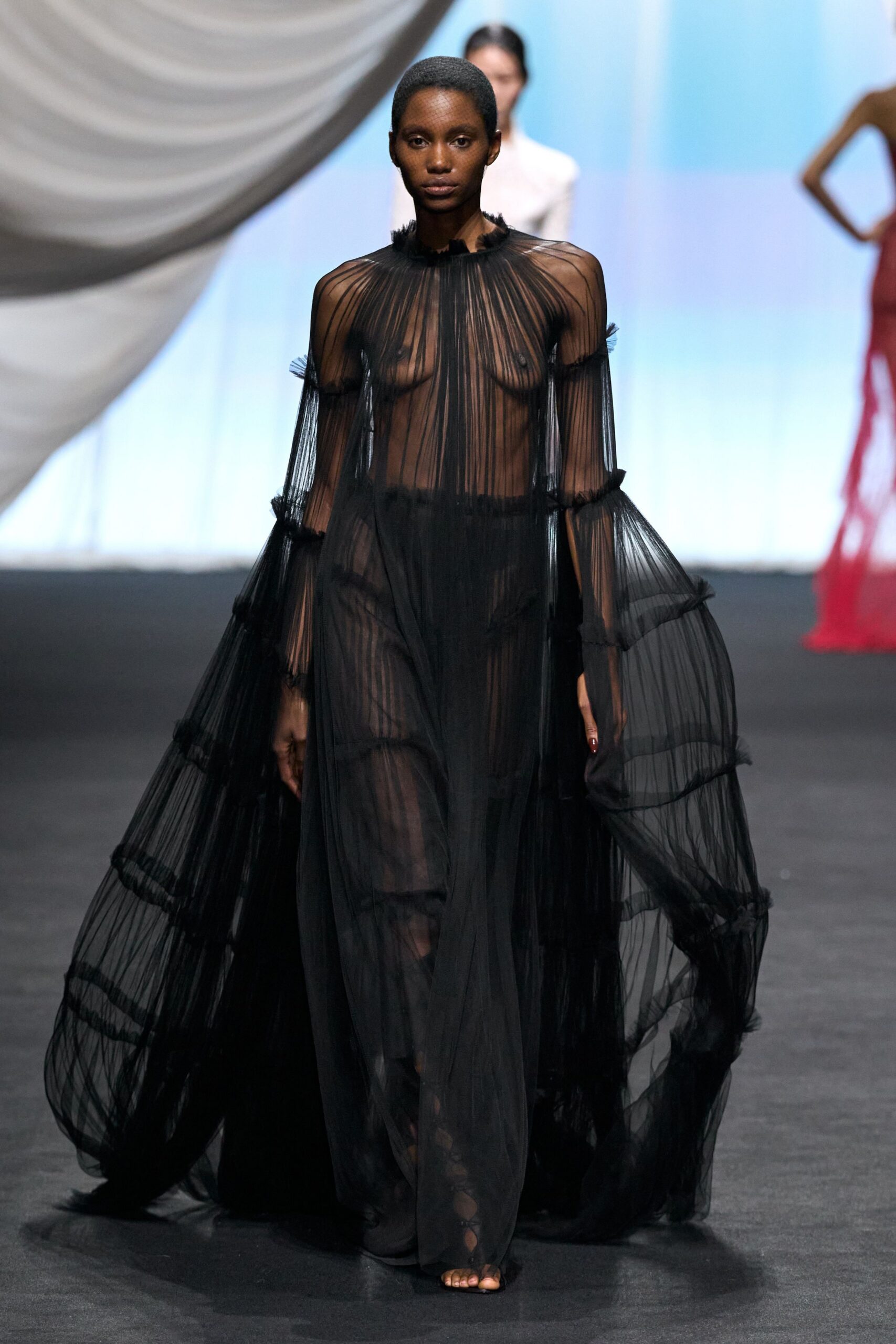 black sheer flowing gown