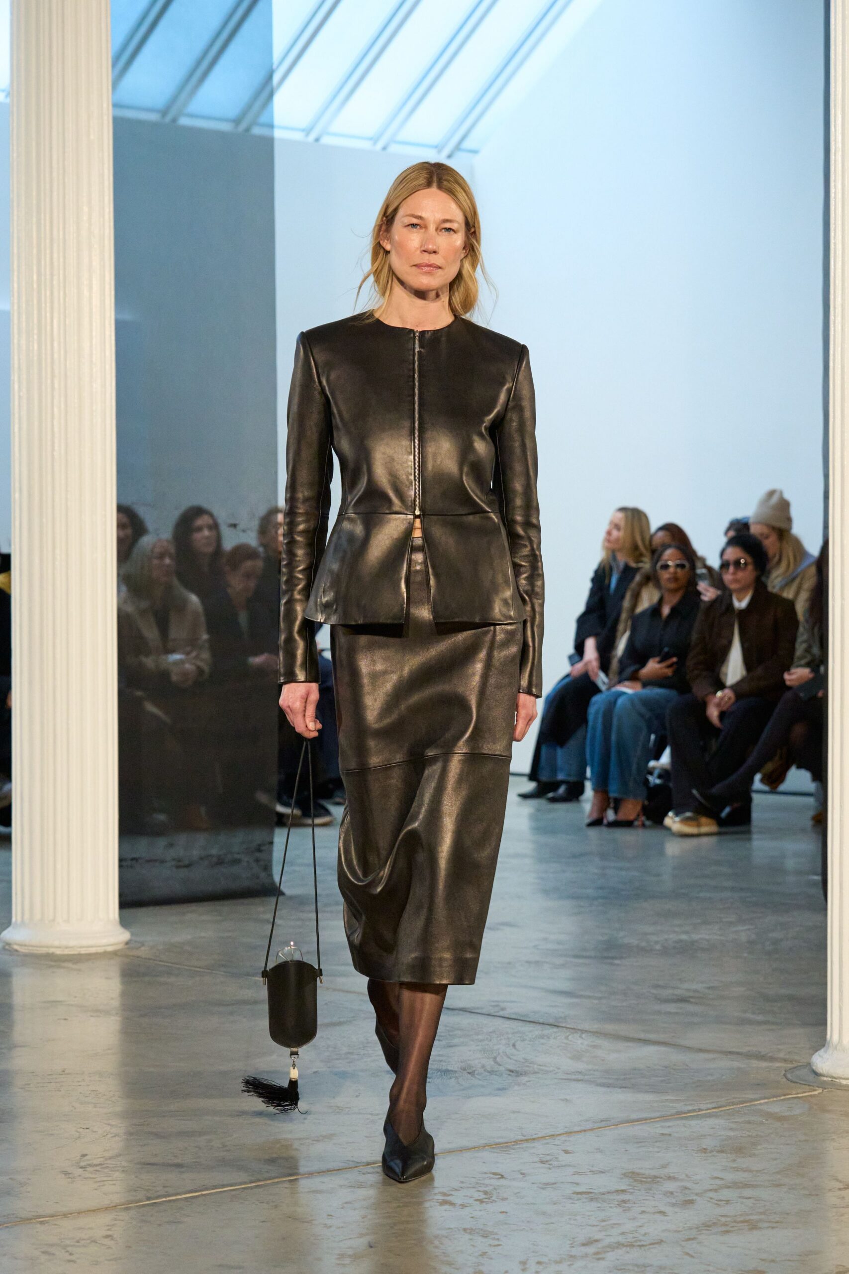 black leather fitted top and skirt