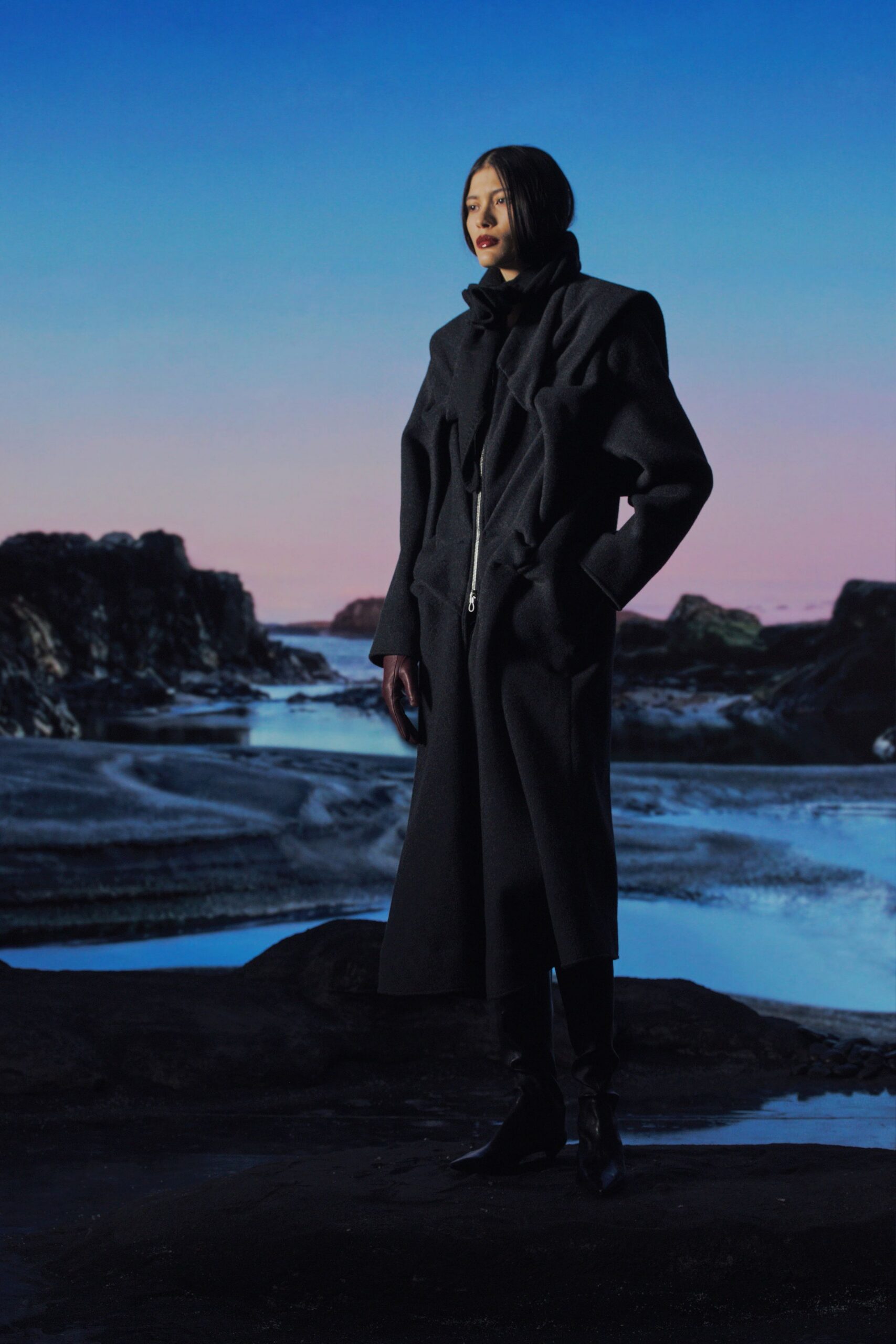 black wool long-sleeve collared fitted zippered layered coat
