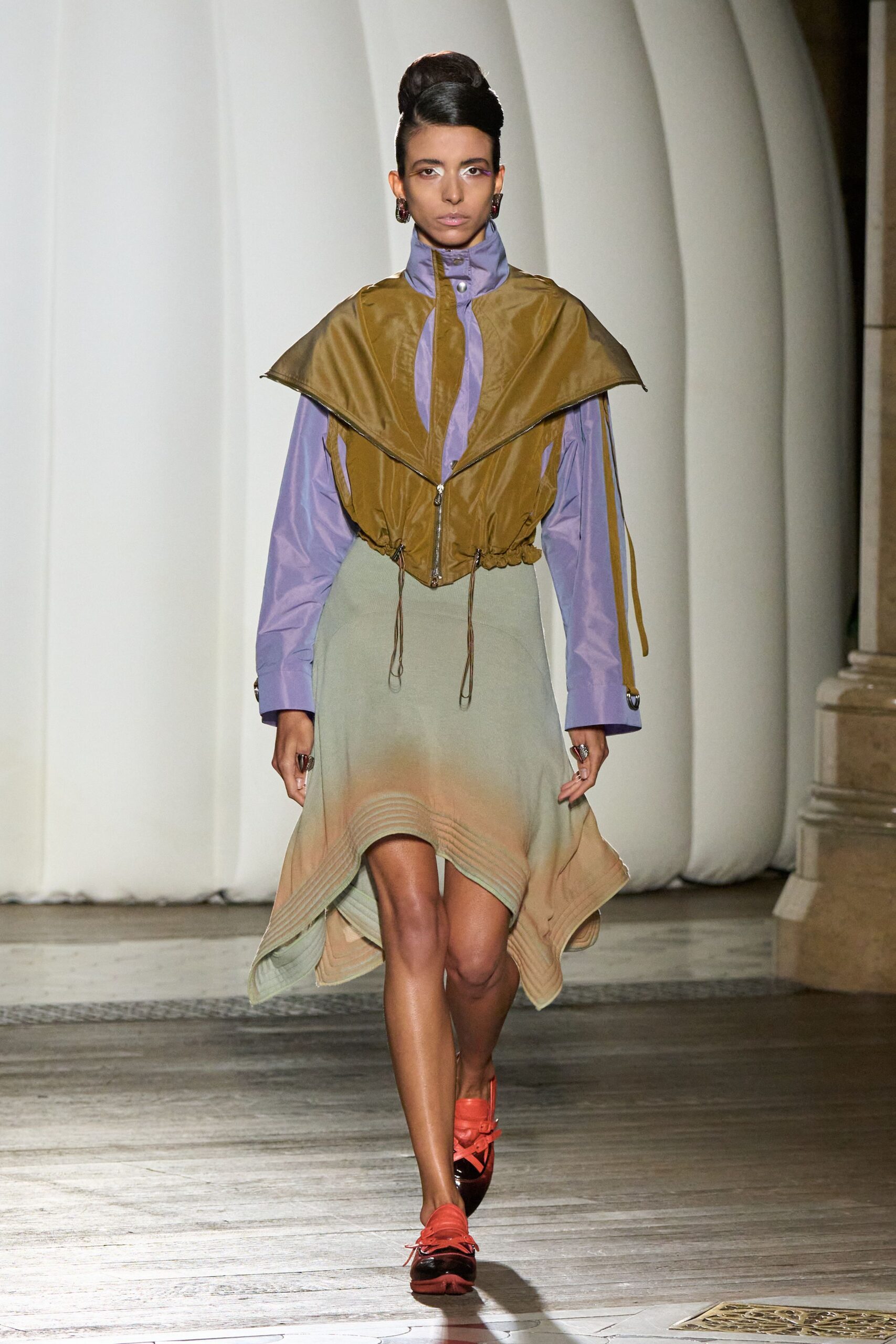 purple cotton top with brown leather vest