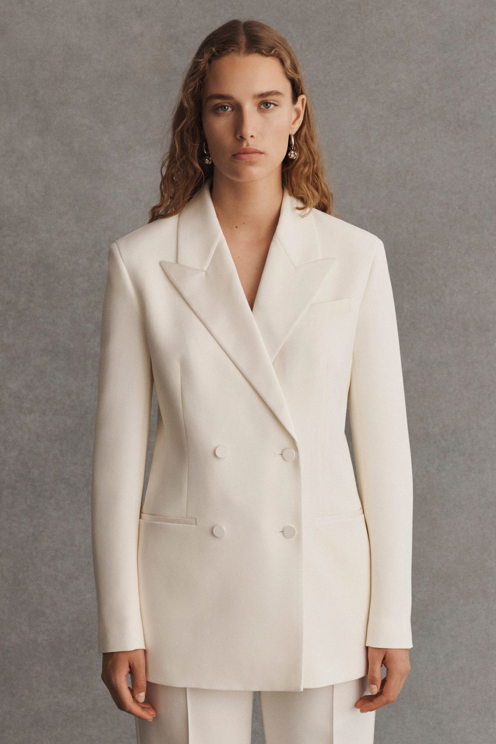 white tailored double-breasted blazer