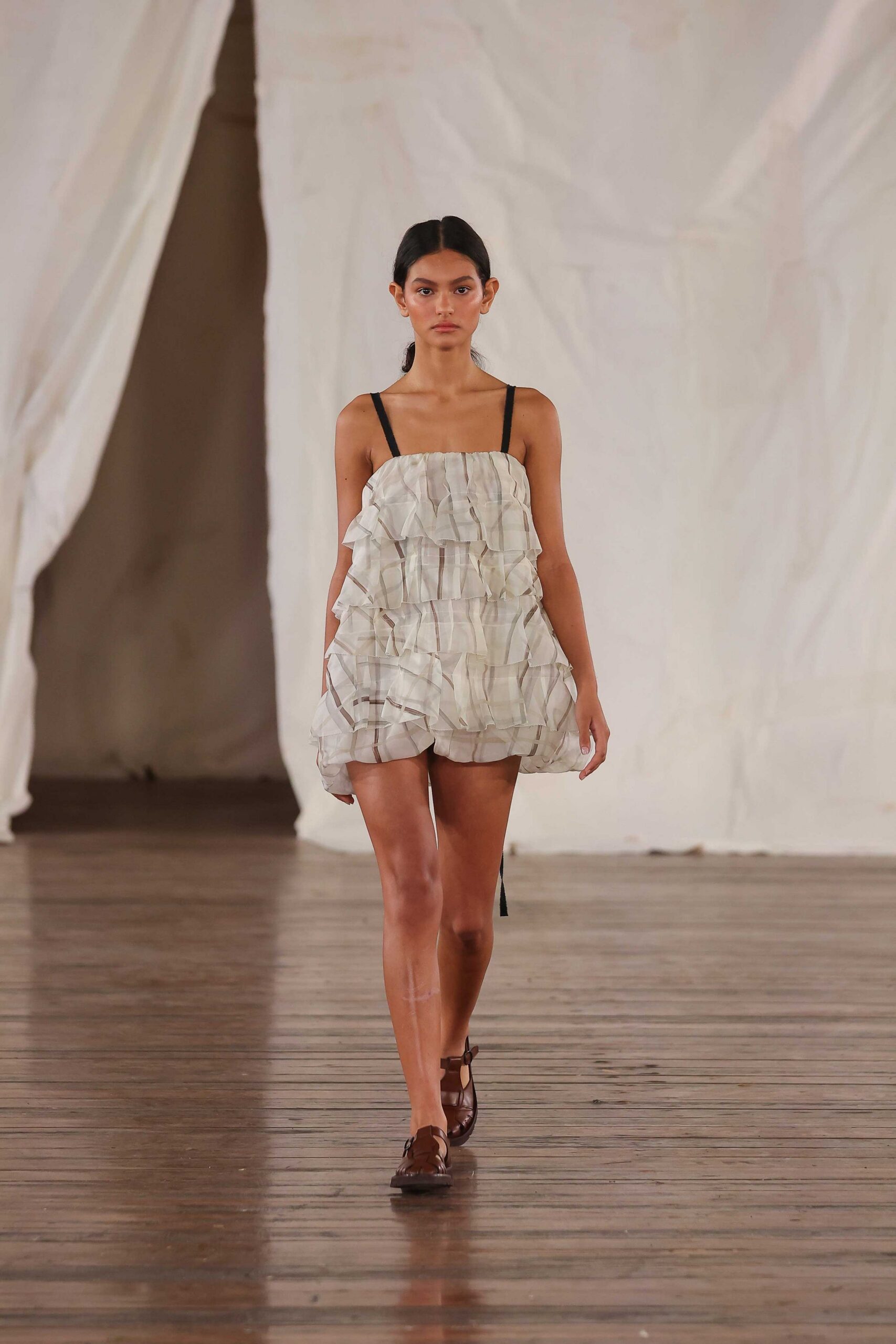 white gray ruffled mini dress with brown shoes