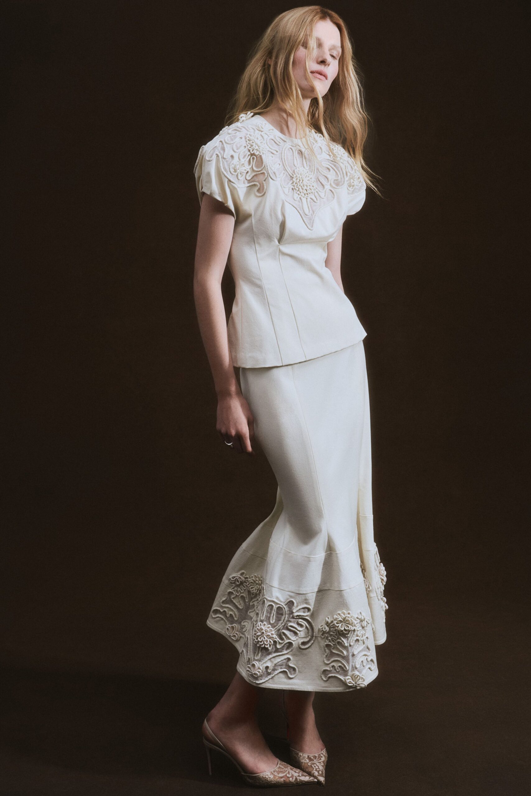 white embroidered top and skirt