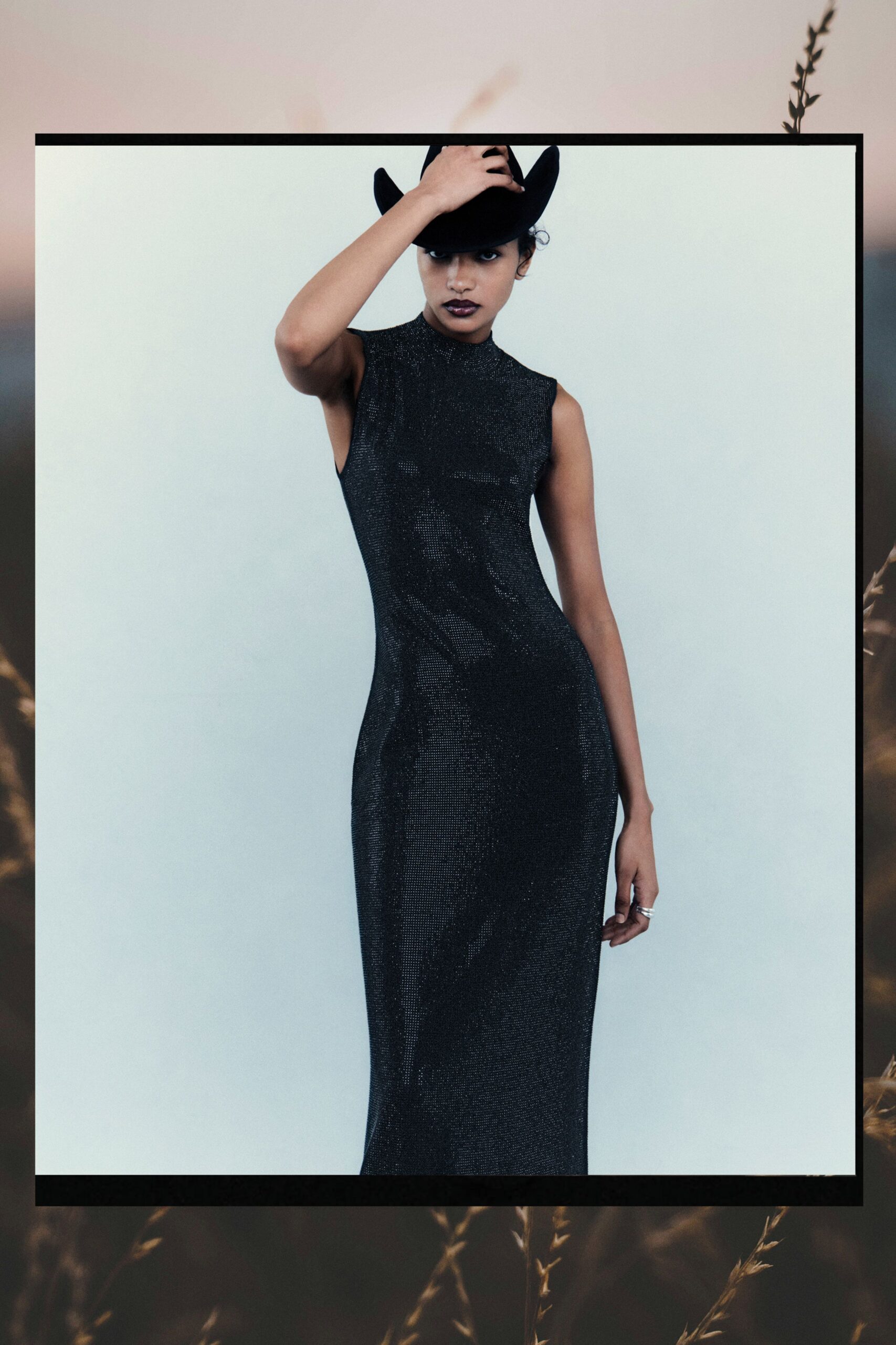 black fitted gown with hat
