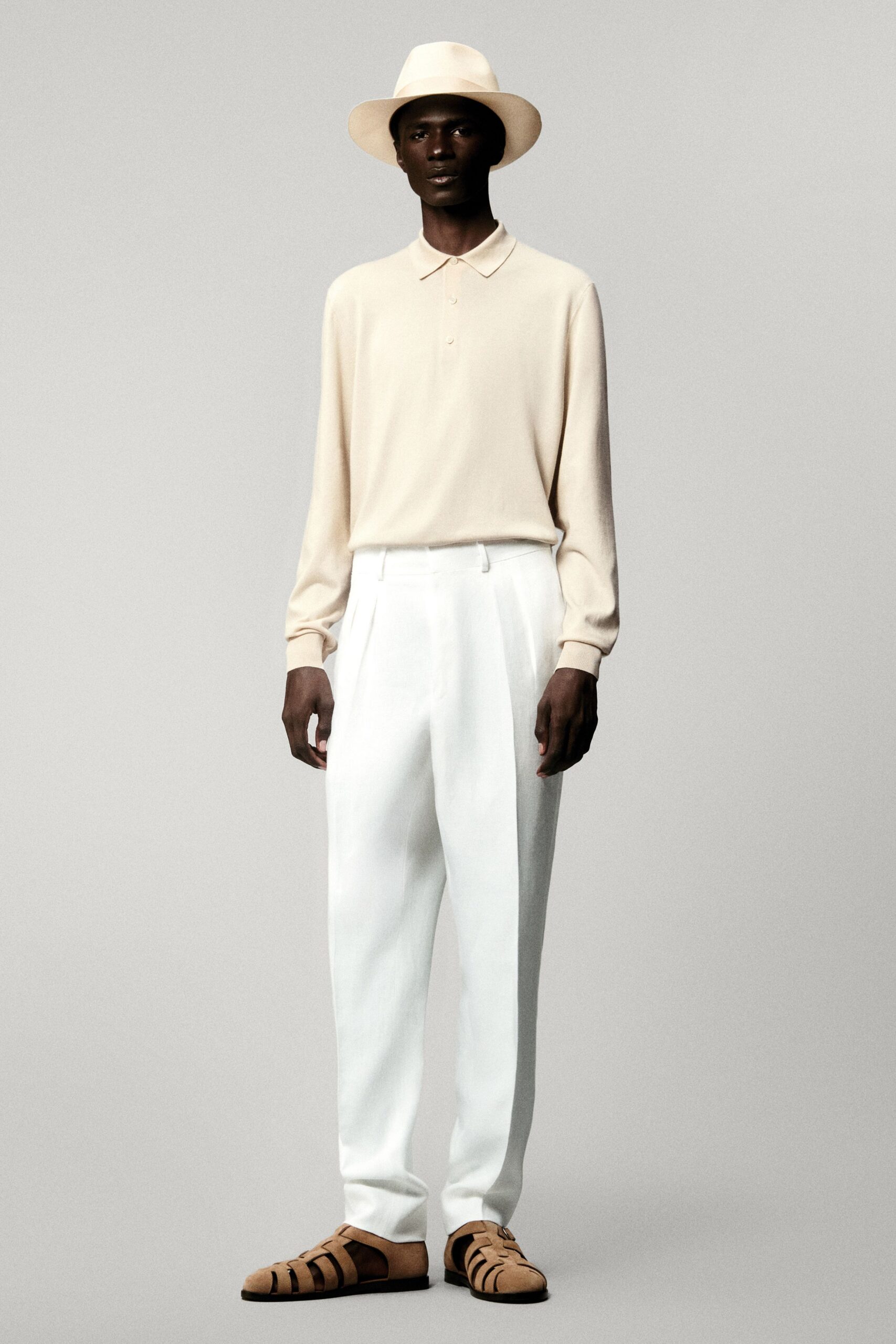 beige shirt white pants sandals