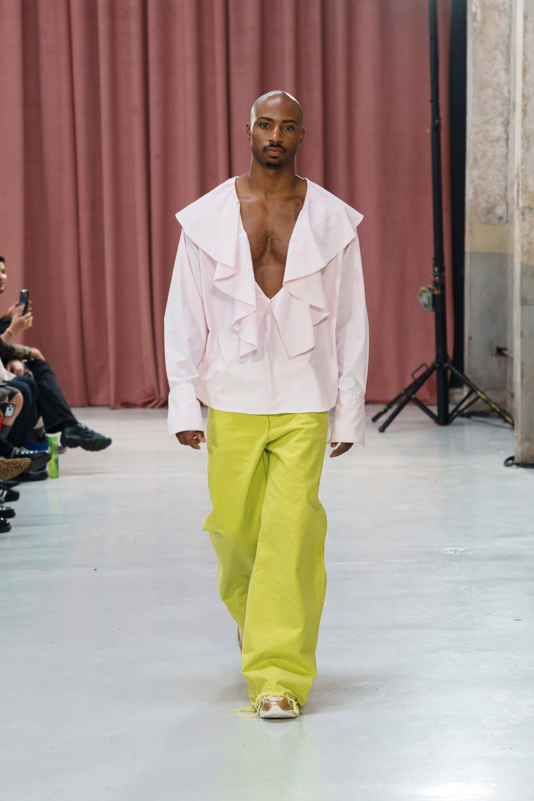 pink ruffled shirt yellow pants